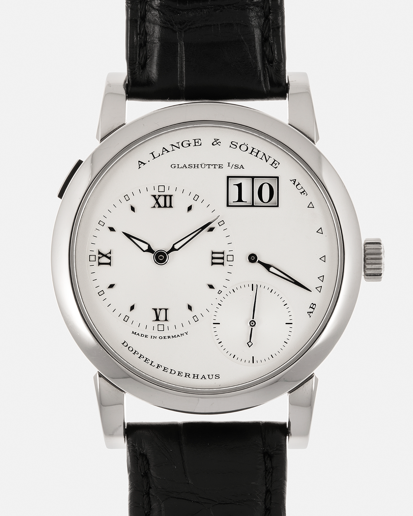 Brand: A. Lange & Söhne
Year: 2010s
Model: Lange 1
Reference: 101.039
Material: 18-carat White Gold
Movement: A. Lange & Söhne Cal. L901.0, Manual-Winding
Case Dimensions: 38.5mm x 9.8mm (Lug-to-Lug 47.3mm)
Lug Width: 20mm
Strap: A. Lange & Söhne Black Alligator Leather Strap with Signed 18-carat White Gold Tang Buckle