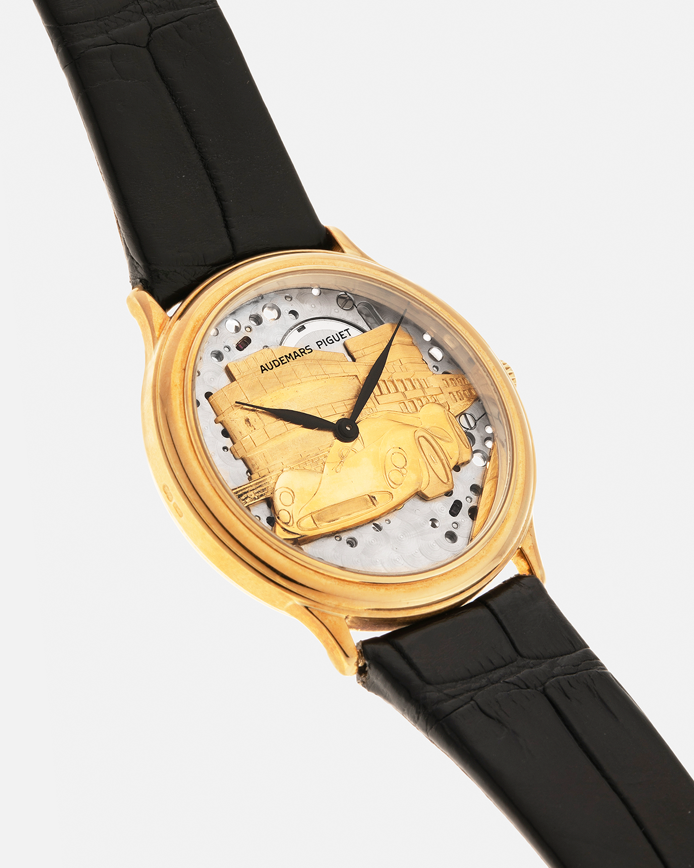 Brand: Audemars Piguet
Year: Early 1990’s
Model: 14677BA
Material: 18-carat Yellow Gold
Movement: Audemars Piguet Cal. 2120, Self-Winding
Case Diameter: 34mm x 7mm (Lug-to-Lug 37mm)
Lug Width: 18mm
Strap: Audemars Piguet Black Alligator Leather Strap with Signed 18-carat Yellow Gold Tang Buckle