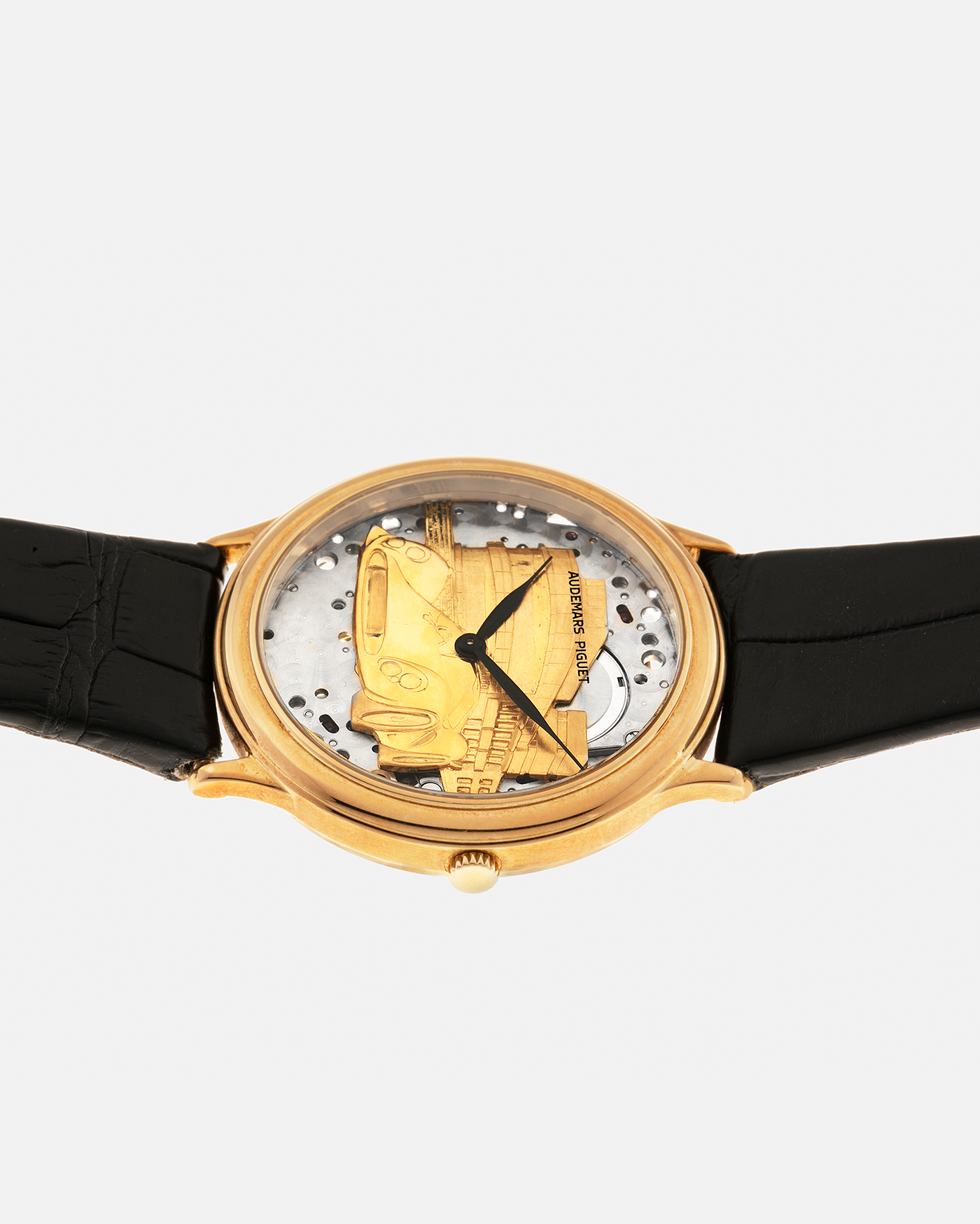 Brand: Audemars Piguet
Year: Early 1990’s
Model: 14677BA
Material: 18-carat Yellow Gold
Movement: Audemars Piguet Cal. 2120, Self-Winding
Case Diameter: 34mm x 7mm (Lug-to-Lug 37mm)
Lug Width: 18mm
Strap: Audemars Piguet Black Alligator Leather Strap with Signed 18-carat Yellow Gold Tang Buckle