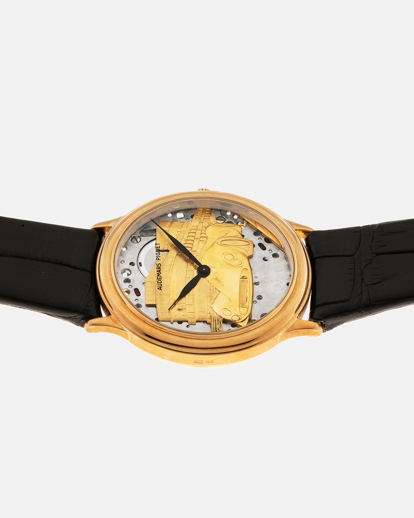 Brand: Audemars Piguet
Year: Early 1990’s
Model: 14677BA
Material: 18-carat Yellow Gold
Movement: Audemars Piguet Cal. 2120, Self-Winding
Case Diameter: 34mm x 7mm (Lug-to-Lug 37mm)
Lug Width: 18mm
Strap: Audemars Piguet Black Alligator Leather Strap with Signed 18-carat Yellow Gold Tang Buckle