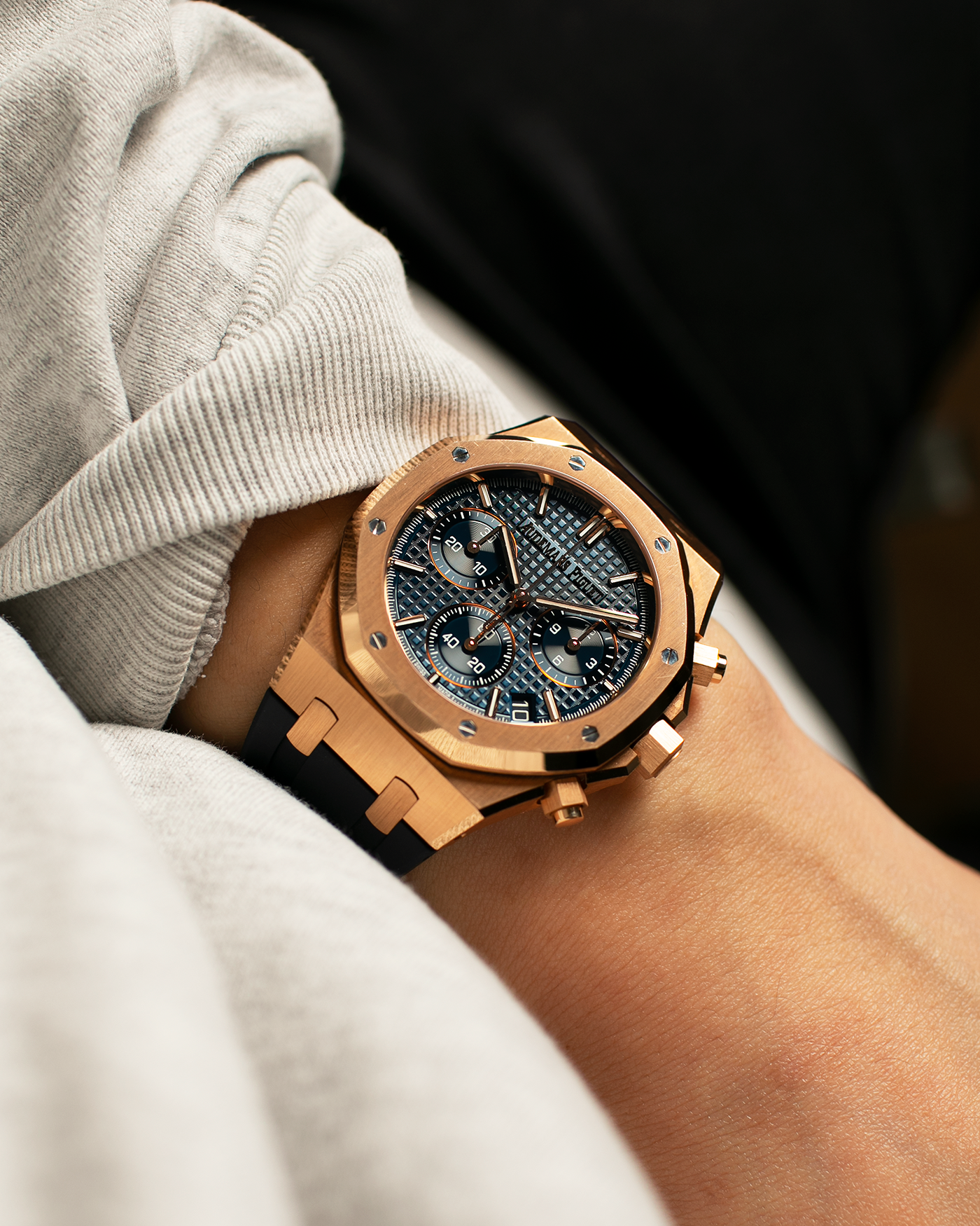 Brand: Audemars Piguet Year: 2022 Model: Royal Oak Chronograph, 50th Anniversary Edition Reference Number: 26240OR.OO.D315CR.01 Material: 18-carat Rose Gold Movement: Audemars Piguet Cal. 4401, Self-Winding Case Dimensions: 41mm x 12.4mm Strap: Audemars Piguet Black Rubber Strap with Signed 18-carat Rose Gold Deployant Clasp, extra Audemars Piguet Blue Alligator Leather Strap