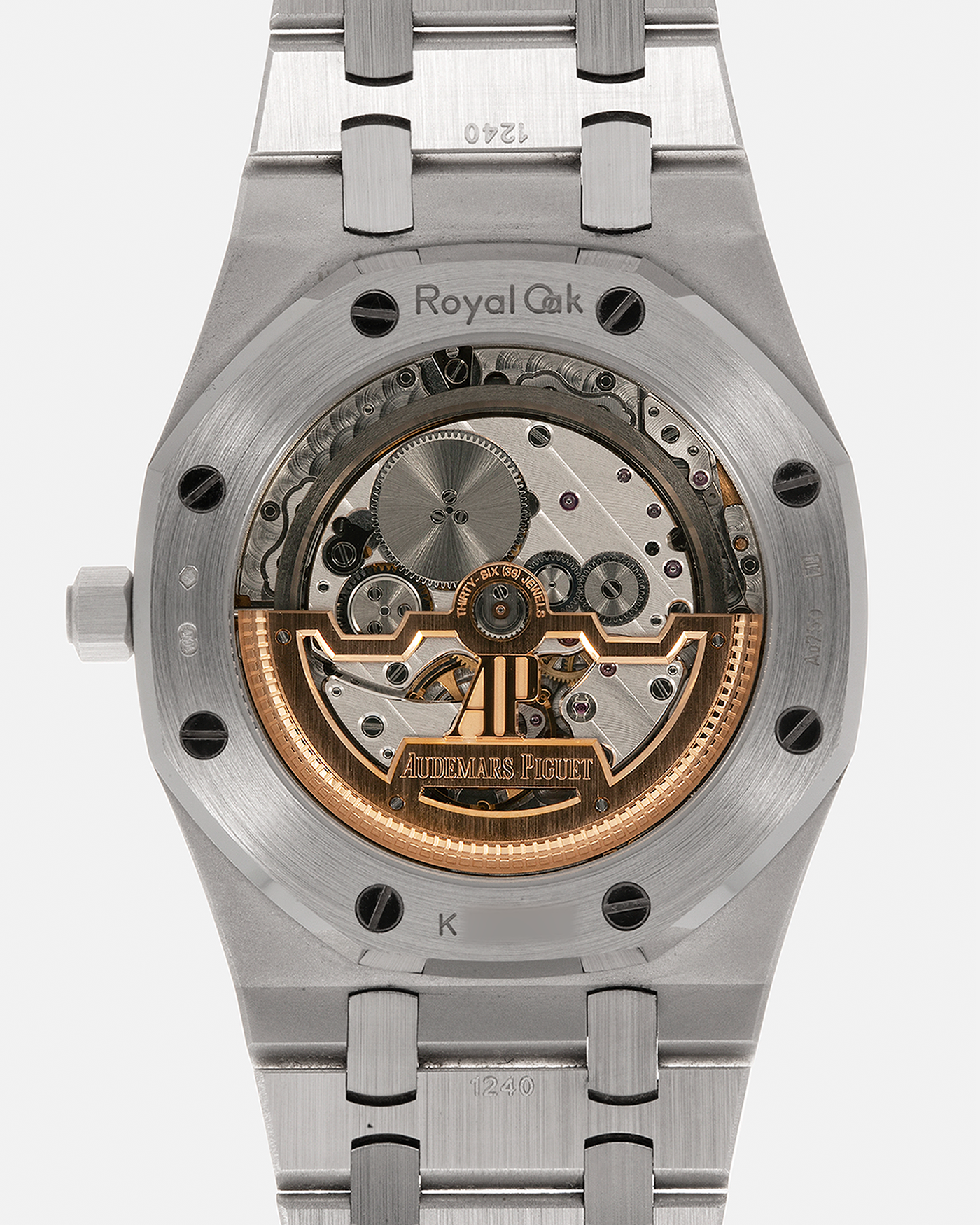 Brand: Audemars Piguet
Year: 2019
Model: Royal Oak
Reference Number: 15202BC.OO.1240BC.01
Material:18-carat White Gold
Movement: Audemars Piguet Cal. 2121 (JLC-derived), Self-Winding
Case Dimensions: 39mm x 8.1mm (48mm Lug-to-Lug)
Bracelet: Audemars Piguet 18-carat White Gold Integrated Bracelet with Signed Clasp