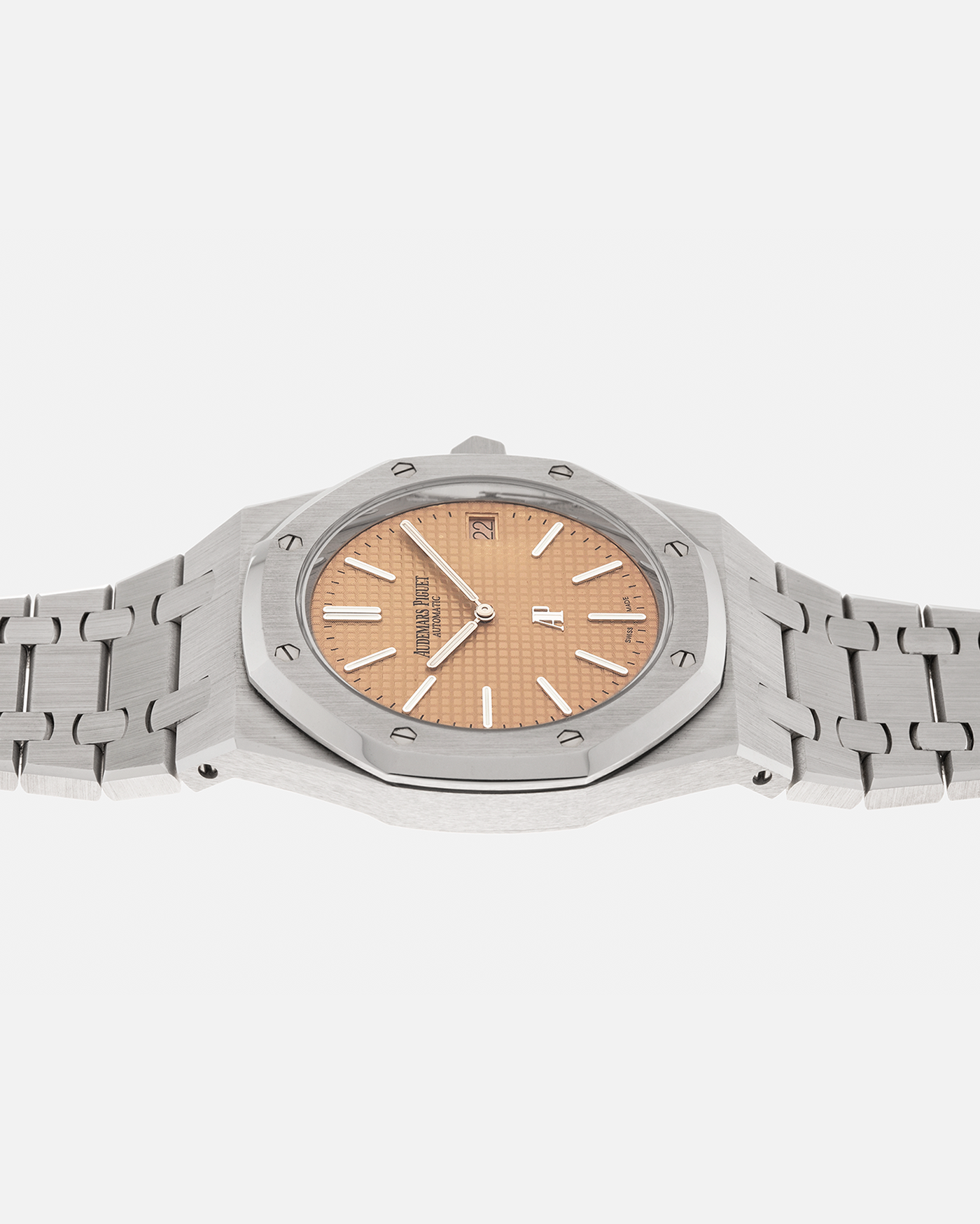 Brand: Audemars Piguet
Year: 2019
Model: Royal Oak
Reference Number: 15202BC.OO.1240BC.01
Material:18-carat White Gold
Movement: Audemars Piguet Cal. 2121 (JLC-derived), Self-Winding
Case Dimensions: 39mm x 8.1mm (48mm Lug-to-Lug)
Bracelet: Audemars Piguet 18-carat White Gold Integrated Bracelet with Signed Clasp