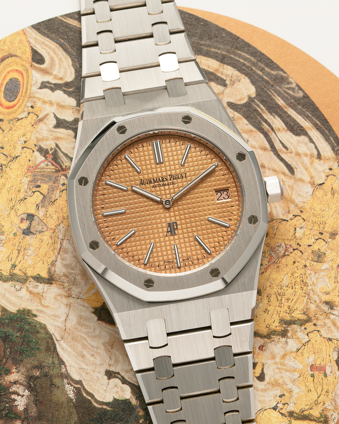 Brand: Audemars Piguet
Year: 2019
Model: Royal Oak
Reference Number: 15202BC.OO.1240BC.01
Material:18-carat White Gold
Movement: Audemars Piguet Cal. 2121 (JLC-derived), Self-Winding
Case Dimensions: 39mm x 8.1mm (48mm Lug-to-Lug)
Bracelet: Audemars Piguet 18-carat White Gold Integrated Bracelet with Signed Clasp