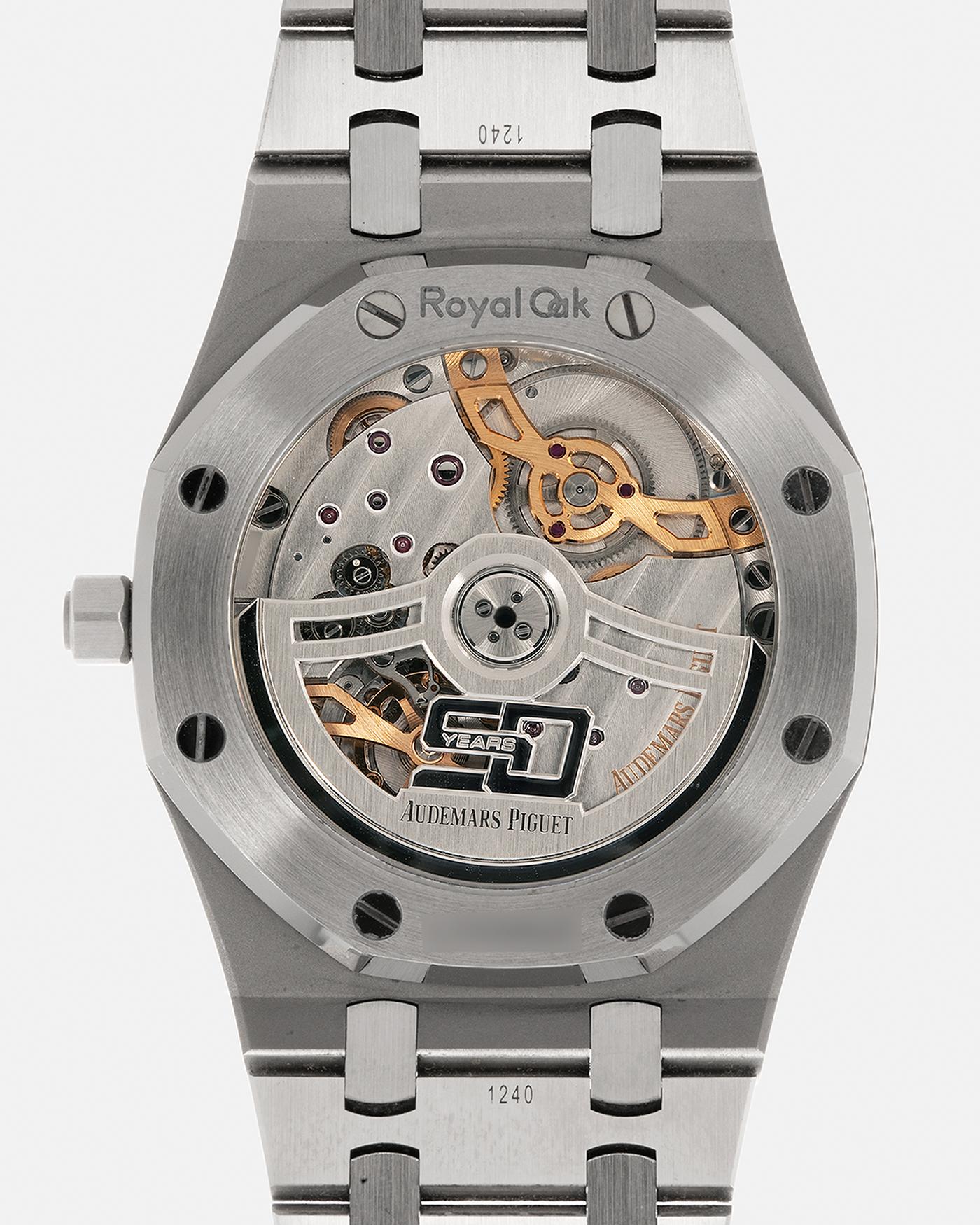 Brand: Audemars Piguet Year: 2022 Model: Royal Oak “Jumbo” Extra-Thin “50th Anniversary” Reference Number: 16202ST.OO.1240ST.01 Material: Stainless Steel Movement: Audemars Piguet Cal. 7121, Self-Winding (Special Engraved Rotor) Case Dimensions: 39mm x 8.1mm Bracelet: Audemars Piguet Stainless Steel Integrated Bracelet