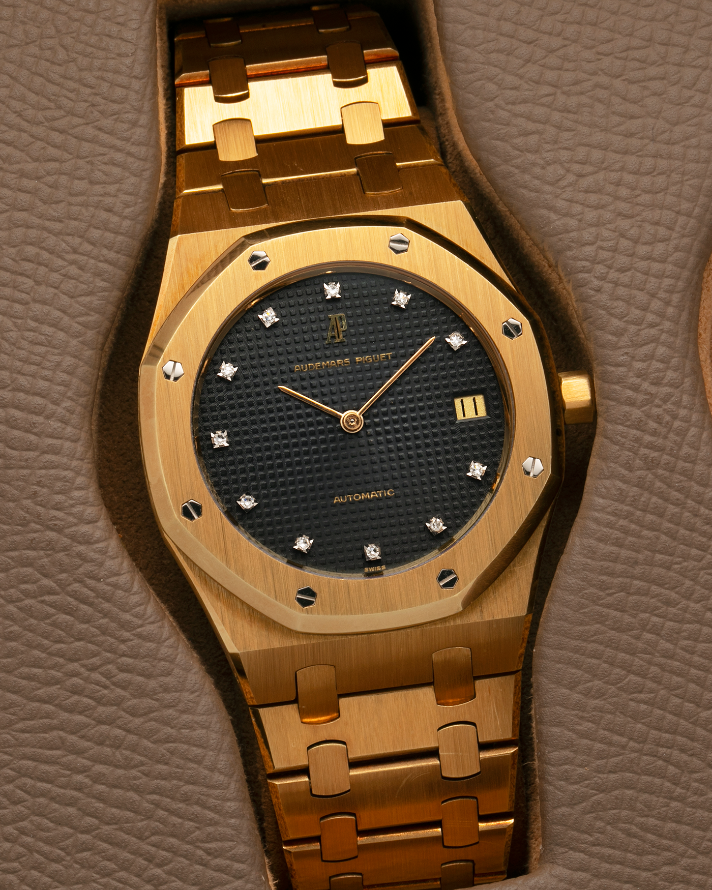 Brand: Audemars Piguet
Year: 1980’s
Model: Royal Oak
Reference Number: 5402BA
Serial Number: 5XX
Material: 18-carat Yellow Gold
Movement: Audemars Piguet Cal. 2121, Self-Winding
Case Dimensions: 39mm x 48mm (Including Lugs) x 7mm
Bracelet: Audemars Piguet Integrated Bracelet in 18-carat Yellow Gold