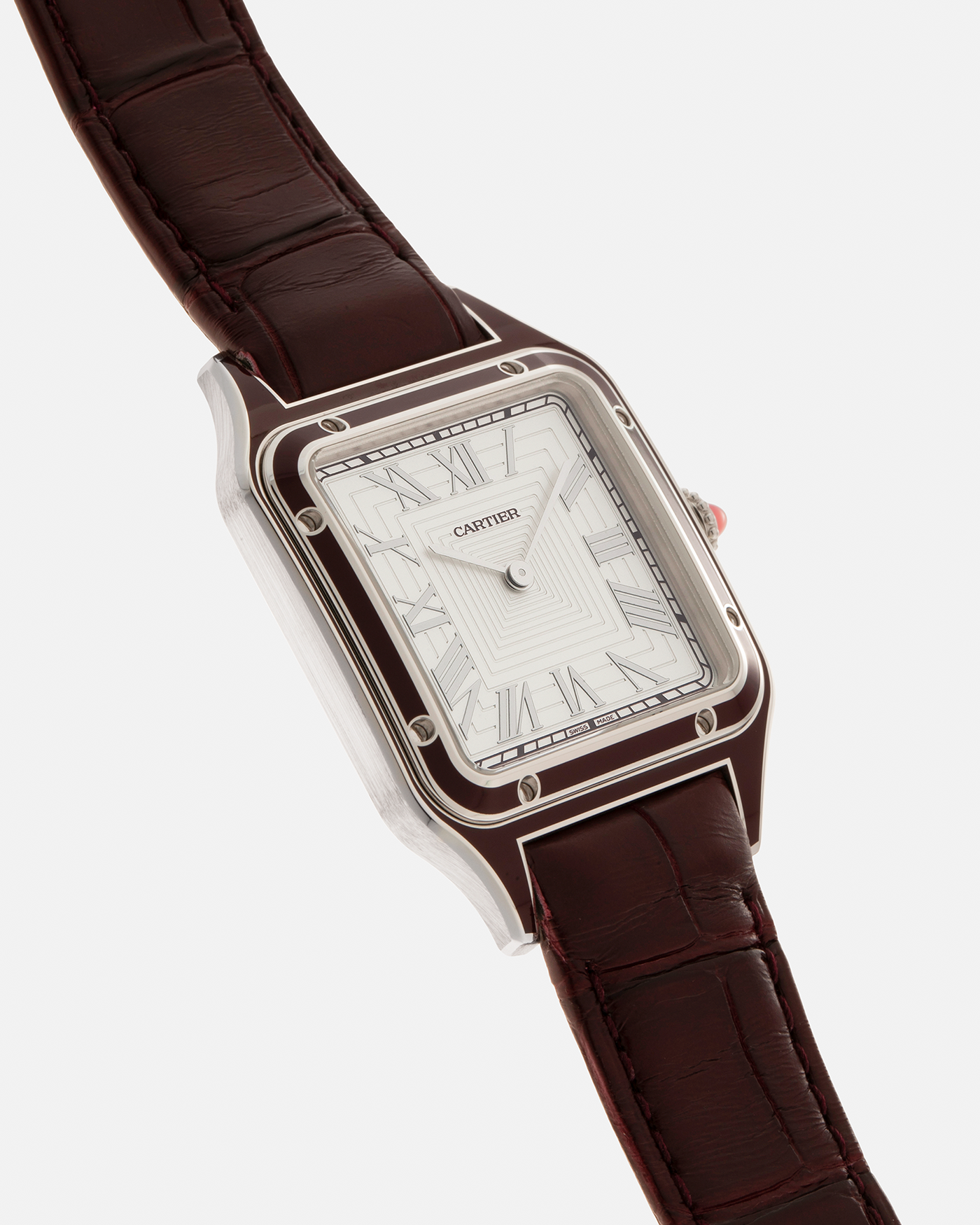 Brand: Cartier Year: 2022 Model: Santos-Dumont Large, Limited Edition of 150 pieces Reference Number: WGSA0053 Material: Platinum 950 Case, Burgundy Lacquered Bezel Movement: Cartier Cal. 430 MC, Manual-Winding Case Diameter: 43.5mm x 31.4mm Strap: Cartier Burgundy Alligator Leather Strap with Signed Platinum 950 Tang Buckle