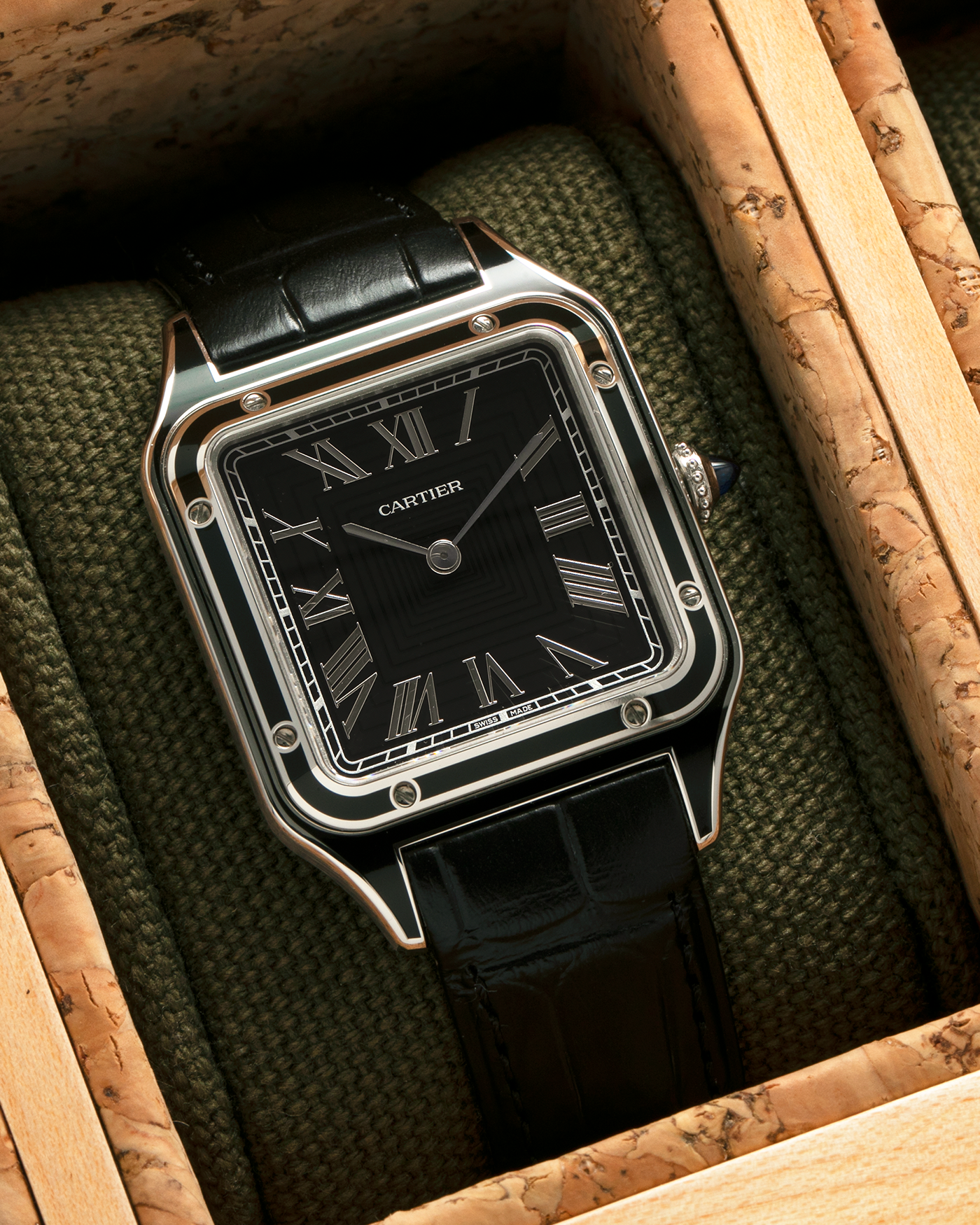 Brand: Cartier Year: 2023 Model: Santos-Dumont Large Reference: CRWSSA0046 Material: Stainless Steel, Black Lacquer Movement: Cartier Cal. 430 MC, Manual-Winding Case Diameter: 43.5mm x 31.4mm Strap: Cartier Black Alligator Leather Strap with Signed Stainless Steel Tang Buckle, Additional Generic Black Leather Strap