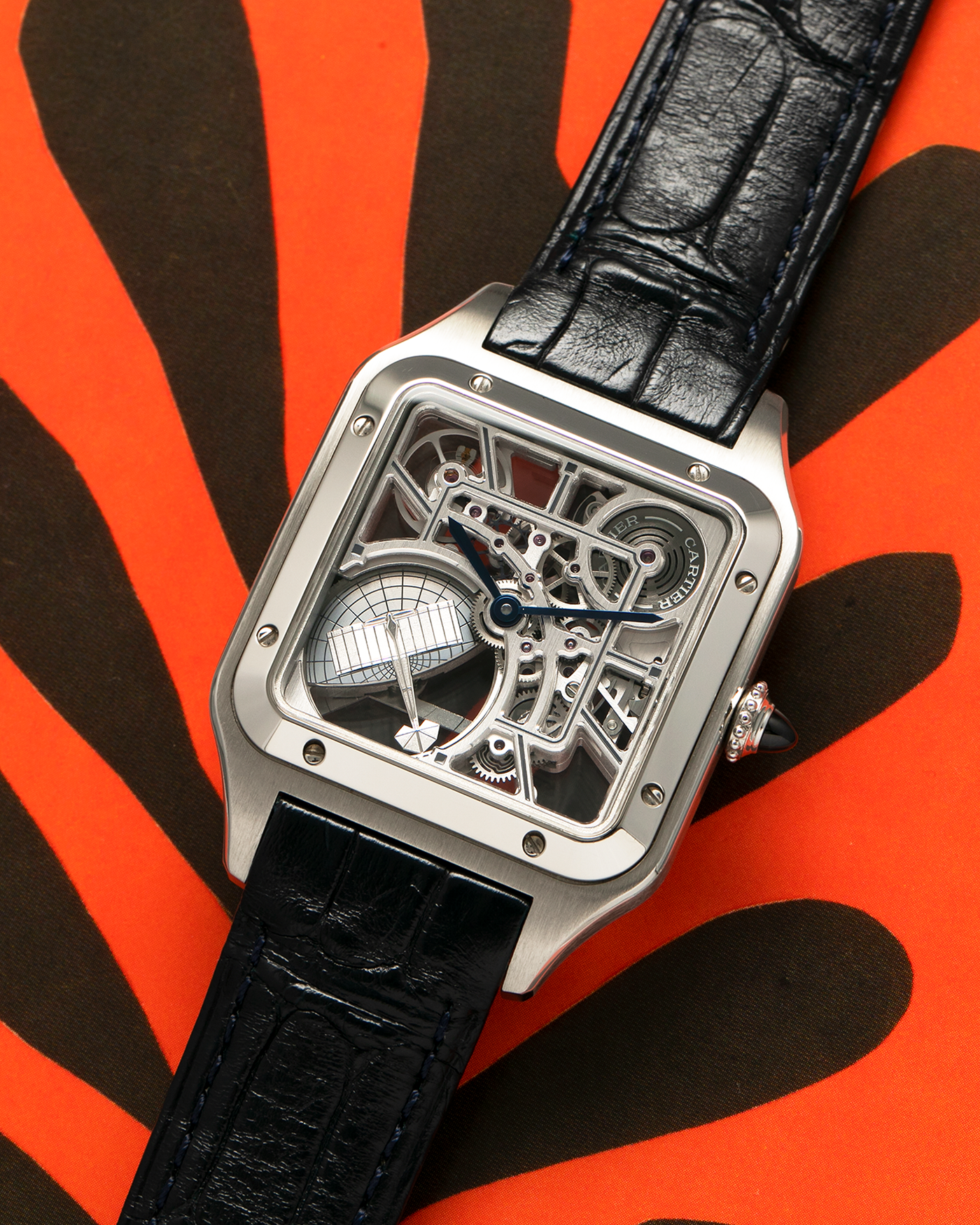 Brand: Cartier
Year: 2023
Model: Santos Dumont Skeleton Micro-Rotor
Reference: CRWHSA0032
Material: Stainless Steel
Movement: Cartier Cal. 9629 MC, Self-Winding Micro-Rotor
Case Dimensions: 31.4mm x 43.5mm (Including Lugs)
Strap: Cartier Dark Navy Alligator Leather Strap with Signed Stainless Steel Ardillon Buckle