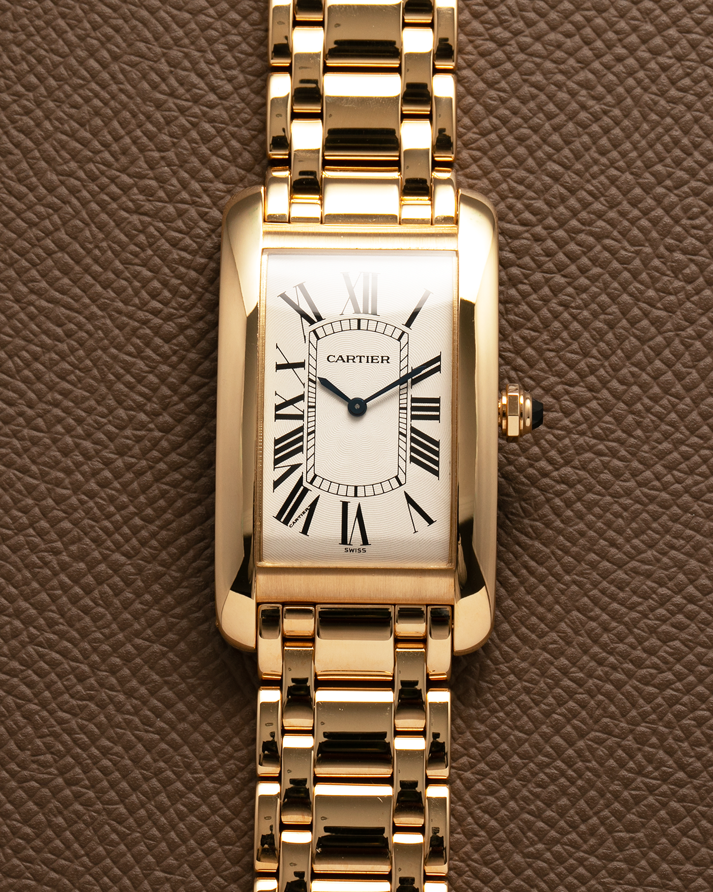 Brand: Cartier Year: 1990s Model: Tank Américaine Reference: 1735-1 Material: 18-carat Yellow Gold Movement: Cartier Cal. 430 MC (Piaget Cal. 430P based), Manual-Winding Case Dimensions: 44mm x 26mm x 7.5mm Lug Width: 18mm Bracelet: Cartier Bracelet in full 18-carat Yellow Gold with Signed Butterfly Clasp