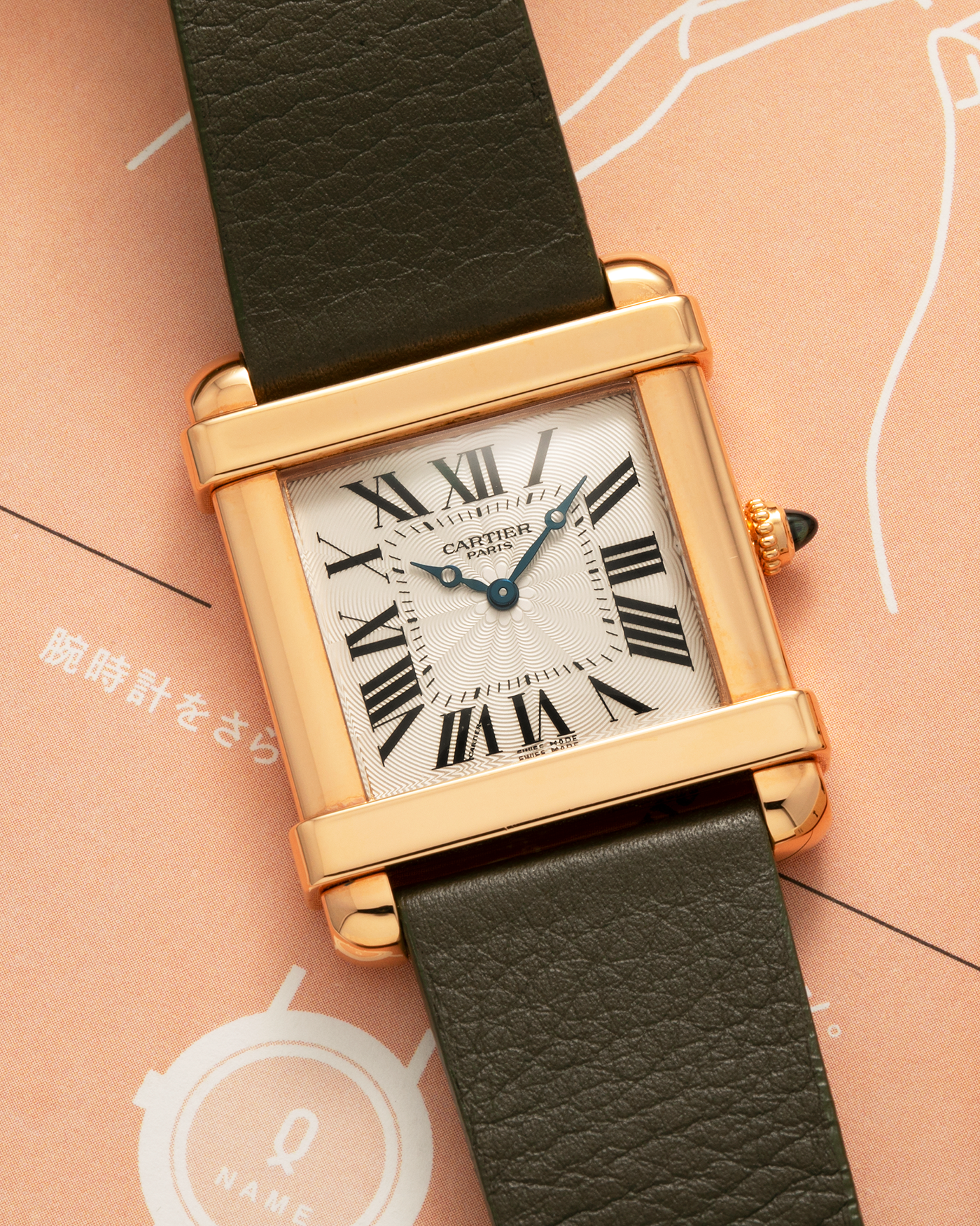 Brand: Cartier
Year: 2006
Model: Collection Privée Cartier Paris Tank Chinoise
Reference Number: 2684G
Material: 18-carat Rose Gold
Movement: Cartier Cal. 437 MC (Based on Piaget Cal. 430P), Manual-Winding
Case Dimensions: 28mm x 29mm x 8mm (37mm Lug-to-Lug)
Lug Width: 21mm
Strap: Custom Khaki Camille Fourmet Leather Strap with Signed 18-carat Rose Gold Deployant Clasp