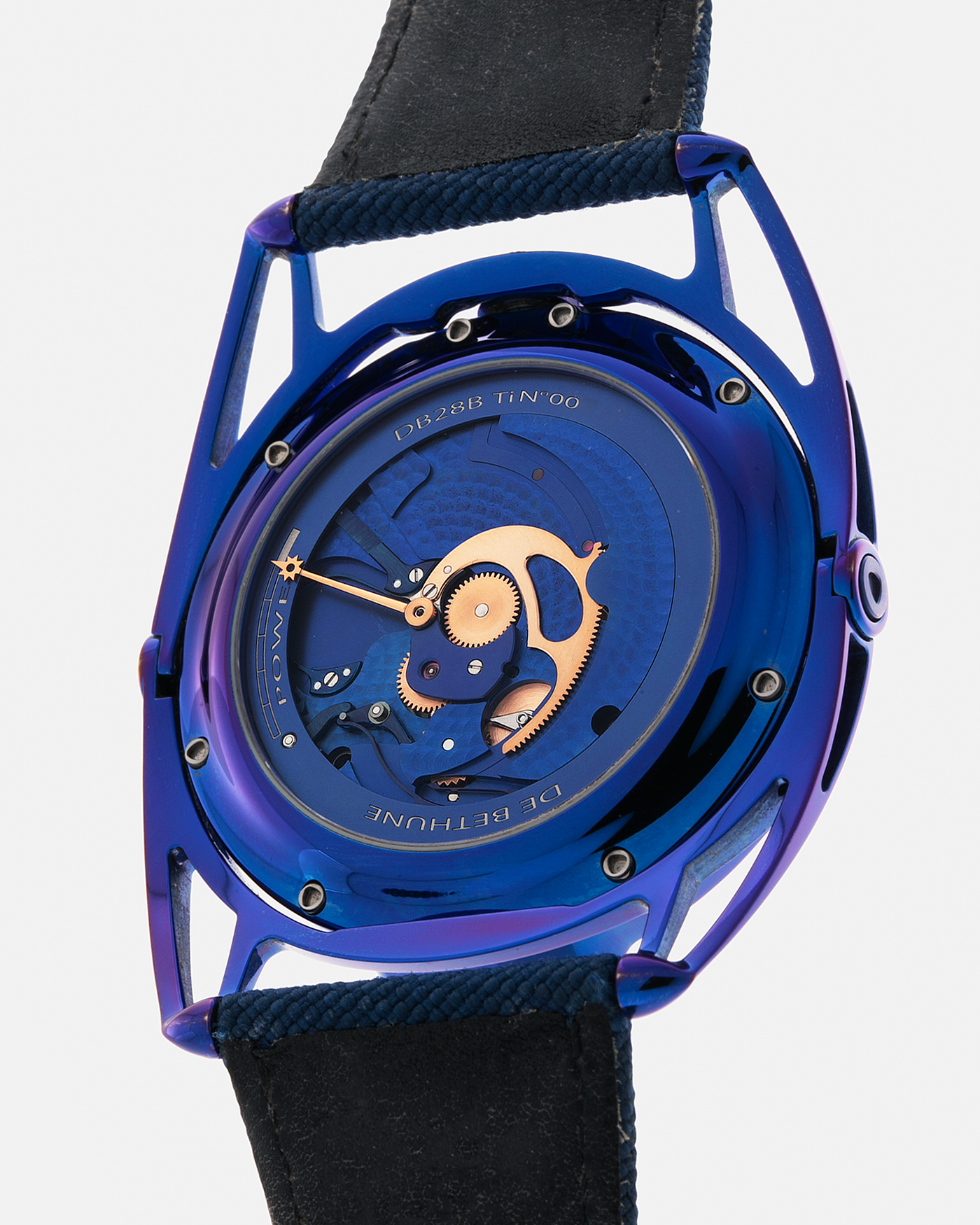 Brand: De Bethune
Year: 2019
Model: DB28 ‘Kind of Blue’
Reference: DB28BTIBN
Case Material: Thermal-Blued Grade 5 Titanium
Movement: De Bethune Cal. DB2115, Manual-Winding
Case Dimensions: 43mm x 11.3mm (Lug-to-Lug 58.3mm)
Strap: De Bethune Dark Blue Textile Strap with Signed Thermally-Blued Titanium Tang Buckle with Gold Pin