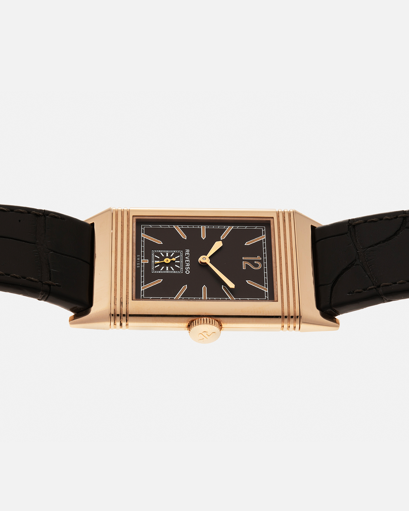 Brand: Jaeger LeCoultre
Year: 2020
Model: Q2782560, Grande Reverso Ultra Thin 1931 ‘Chocolate’
Reference Number: 277.2.22
Material: 18-carat Rose Gold
Movement: Jaeger LeCoultre Cal. 822/2, Manual-Winding
Case Diameter:  46.8mm (Including Lugs) x 27.4mm x 7.3mm
Lug Width: 20mm
Strap: Jaeger LeCoultre Dark Brown Alligator Leather Strap with Signed 18-carat Rose Gold Tang Buckle