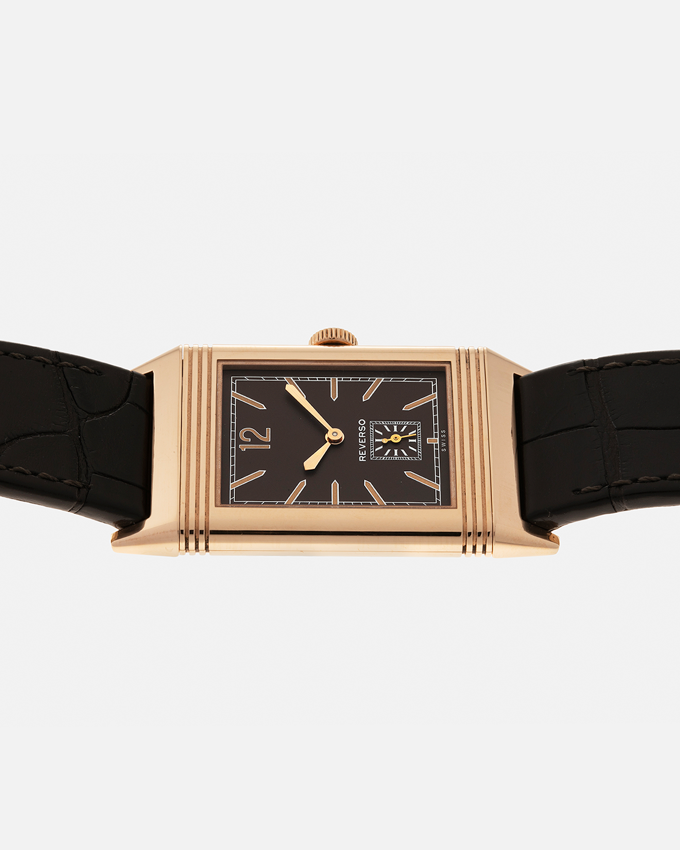 Brand: Jaeger LeCoultre
Year: 2020
Model: Q2782560, Grande Reverso Ultra Thin 1931 ‘Chocolate’
Reference Number: 277.2.22
Material: 18-carat Rose Gold
Movement: Jaeger LeCoultre Cal. 822/2, Manual-Winding
Case Diameter:  46.8mm (Including Lugs) x 27.4mm x 7.3mm
Lug Width: 20mm
Strap: Jaeger LeCoultre Dark Brown Alligator Leather Strap with Signed 18-carat Rose Gold Tang Buckle