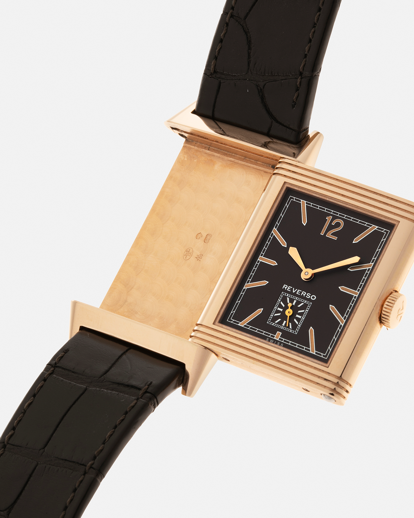 Brand: Jaeger LeCoultre
Year: 2020
Model: Q2782560, Grande Reverso Ultra Thin 1931 ‘Chocolate’
Reference Number: 277.2.22
Material: 18-carat Rose Gold
Movement: Jaeger LeCoultre Cal. 822/2, Manual-Winding
Case Diameter:  46.8mm (Including Lugs) x 27.4mm x 7.3mm
Lug Width: 20mm
Strap: Jaeger LeCoultre Dark Brown Alligator Leather Strap with Signed 18-carat Rose Gold Tang Buckle