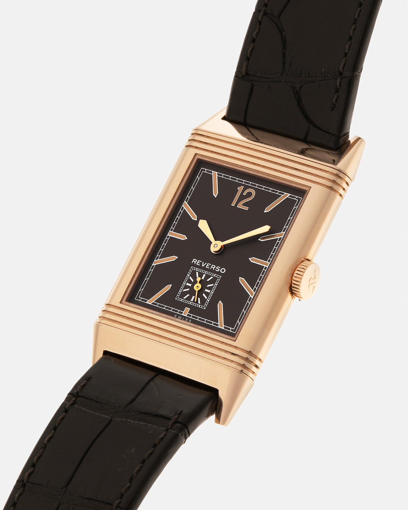 Brand: Jaeger LeCoultre
Year: 2020
Model: Q2782560, Grande Reverso Ultra Thin 1931 ‘Chocolate’
Reference Number: 277.2.22
Material: 18-carat Rose Gold
Movement: Jaeger LeCoultre Cal. 822/2, Manual-Winding
Case Diameter:  46.8mm (Including Lugs) x 27.4mm x 7.3mm
Lug Width: 20mm
Strap: Jaeger LeCoultre Dark Brown Alligator Leather Strap with Signed 18-carat Rose Gold Tang Buckle