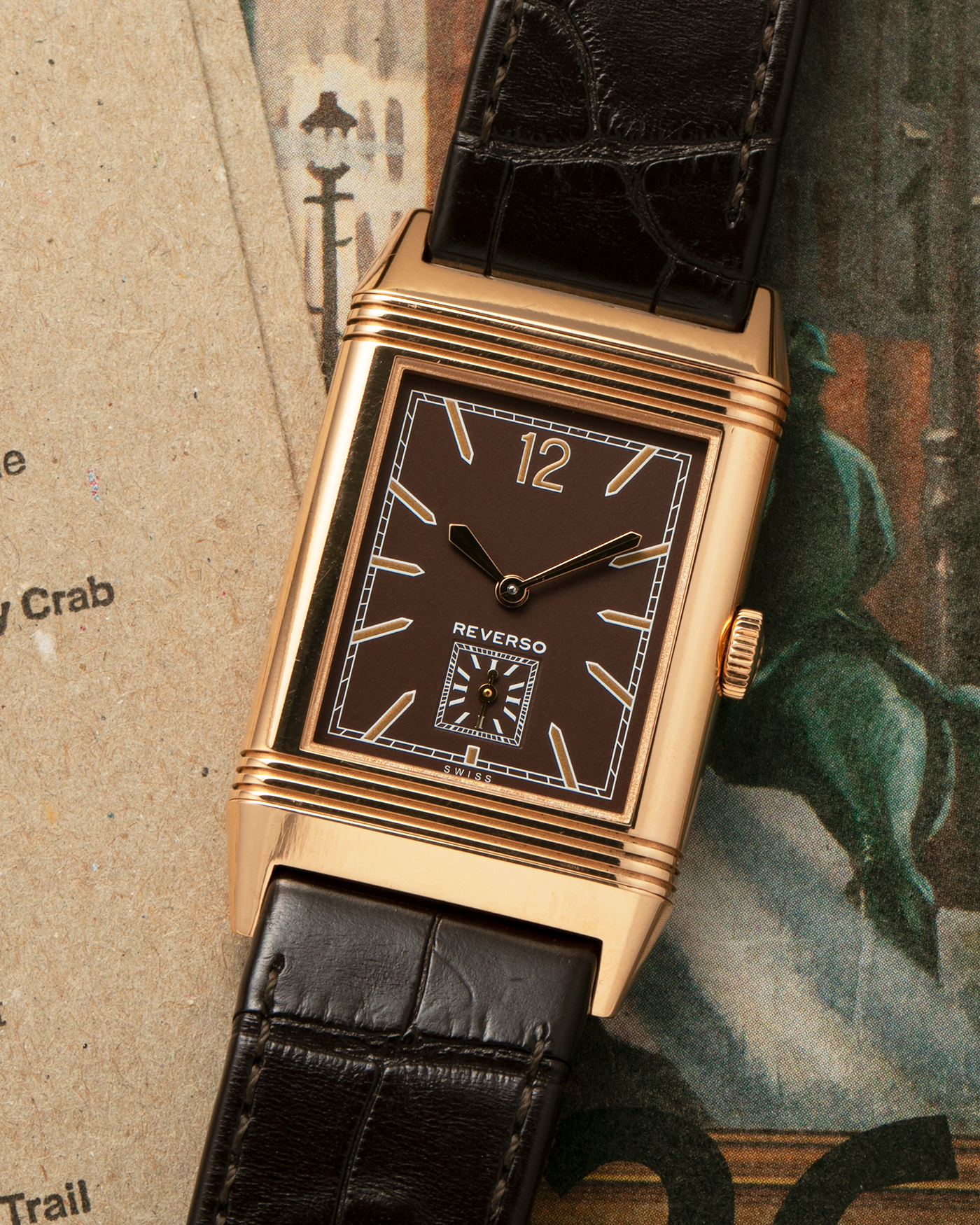 Brand: Jaeger LeCoultre
Year: 2020
Model: Q2782560, Grande Reverso Ultra Thin 1931 ‘Chocolate’
Reference Number: 277.2.22
Material: 18-carat Rose Gold
Movement: Jaeger LeCoultre Cal. 822/2, Manual-Winding
Case Diameter:  46.8mm (Including Lugs) x 27.4mm x 7.3mm
Lug Width: 20mm
Strap: Jaeger LeCoultre Dark Brown Alligator Leather Strap with Signed 18-carat Rose Gold Tang Buckle