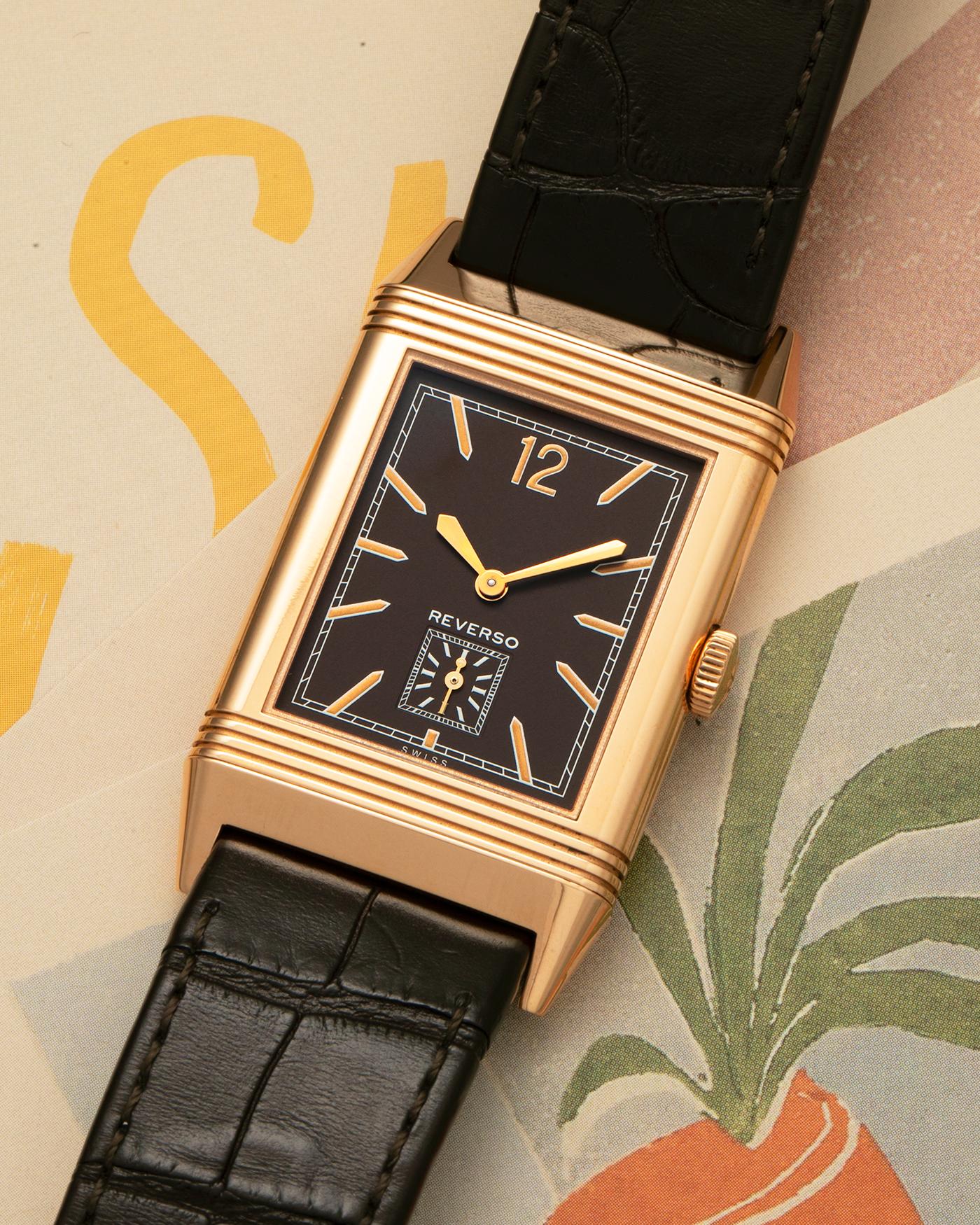 Brand: Jaeger LeCoultre
Year: 2020
Model: Q2782560, Grande Reverso Ultra Thin 1931 ‘Chocolate’
Reference Number: 277.2.22
Material: 18-carat Rose Gold
Movement: Jaeger LeCoultre Cal. 822/2, Manual-Winding
Case Diameter:  46.8mm (Including Lugs) x 27.4mm x 7.3mm
Lug Width: 20mm
Strap: Jaeger LeCoultre Dark Brown Alligator Leather Strap with Signed 18-carat Rose Gold Tang Buckle