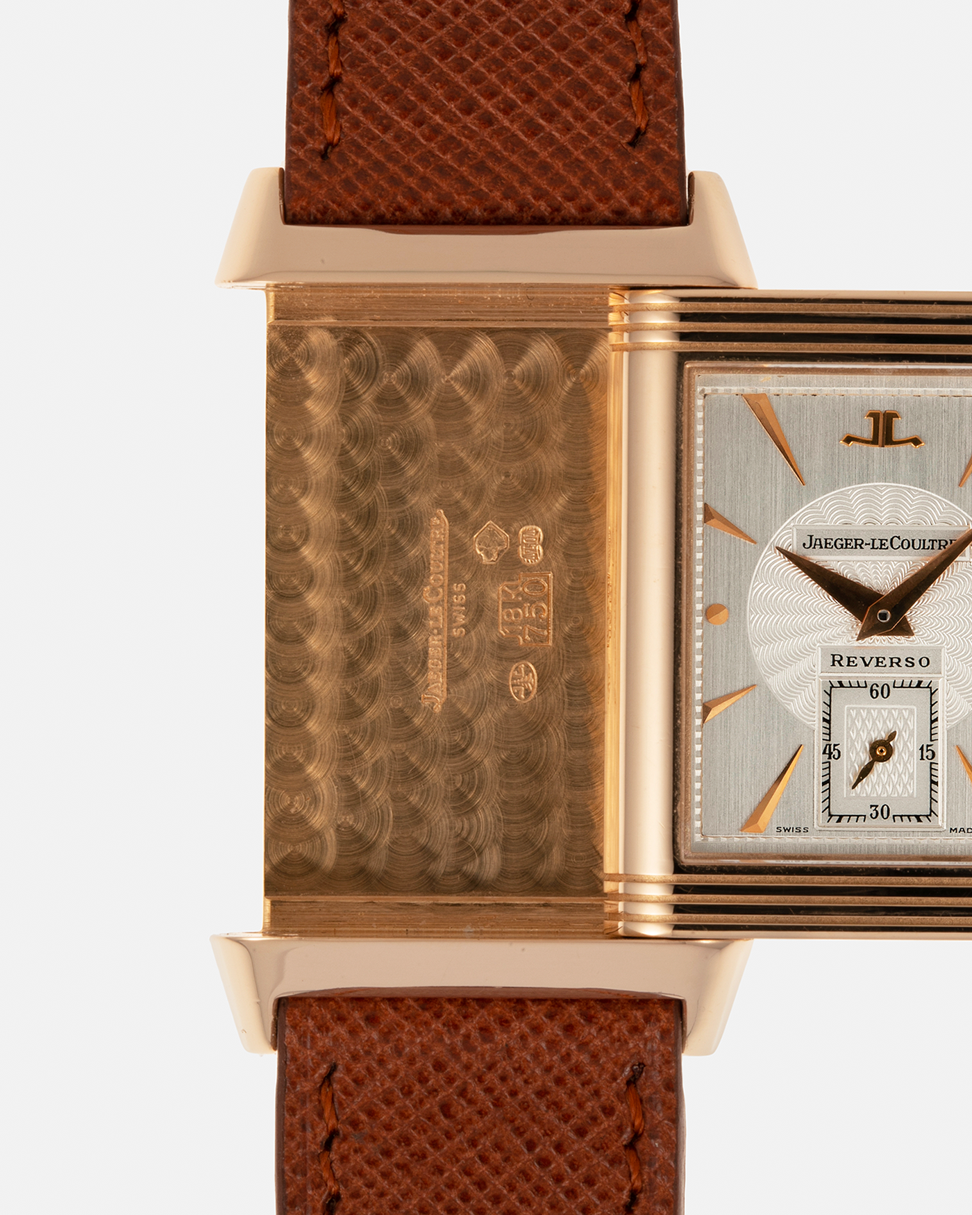 Brand: Jaeger LeCoultre
Year: 1990s
Model: Reverso Art Deco Skeleton Movement (Only 900 Pieces Made in Rose Gold)
Reference Number: 270.2.62 / Q2772420
Material: 18-carat Rose Gold
Movement: Jaeger LeCoultre Cal. 822AD, Manual-Winding
Case Diameter: 42mm (Including Lugs) x 26mm x 9.5mm
Lug Width: 19mm
Strap: Mr Watchley Saffiano Copper Brown Leather Strap with Signed 18-carat Rose Gold Deployant Clasp