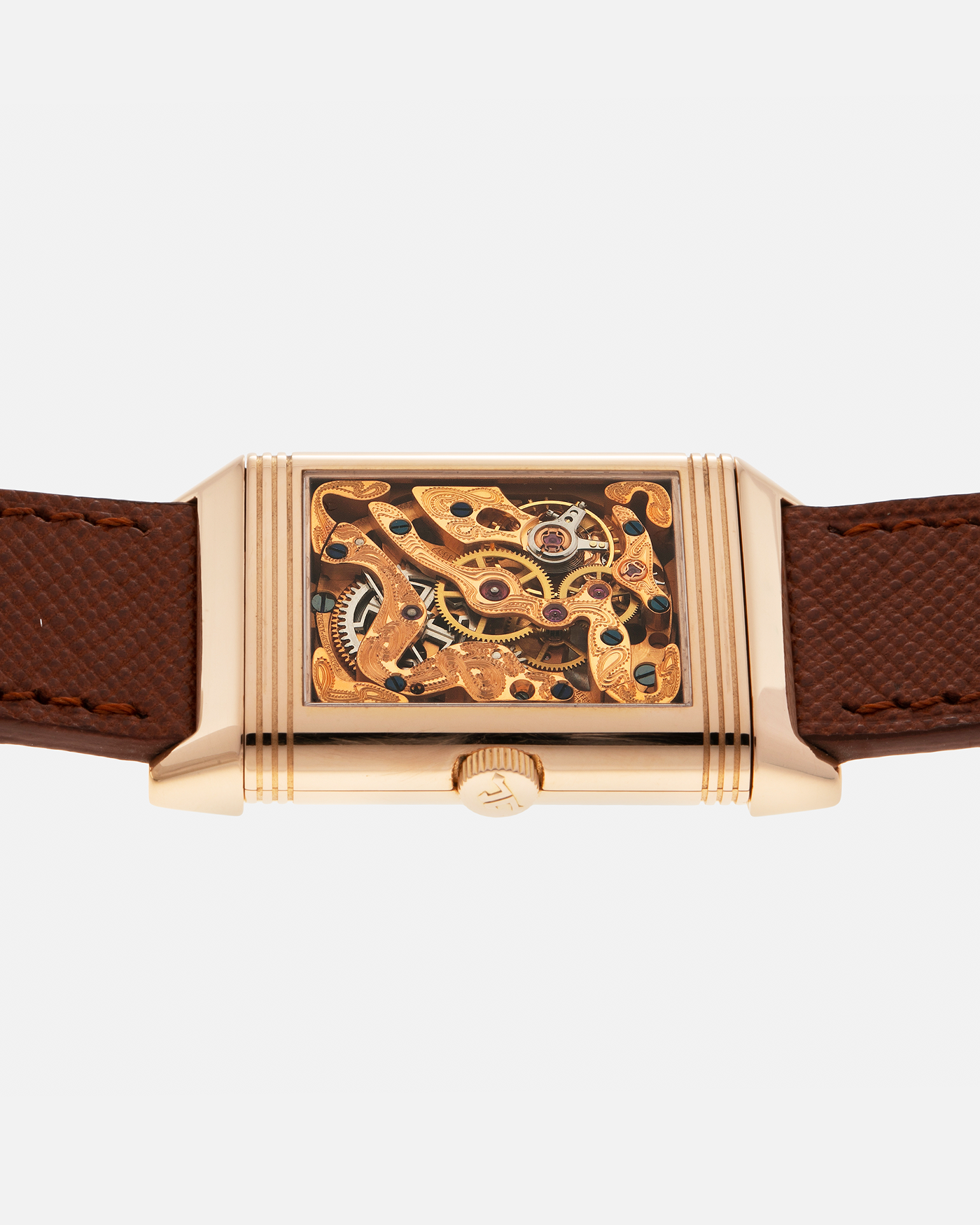 Brand: Jaeger LeCoultre
Year: 1990s
Model: Reverso Art Deco Skeleton Movement (Only 900 Pieces Made in Rose Gold)
Reference Number: 270.2.62 / Q2772420
Material: 18-carat Rose Gold
Movement: Jaeger LeCoultre Cal. 822AD, Manual-Winding
Case Diameter: 42mm (Including Lugs) x 26mm x 9.5mm
Lug Width: 19mm
Strap: Mr Watchley Saffiano Copper Brown Leather Strap with Signed 18-carat Rose Gold Deployant Clasp