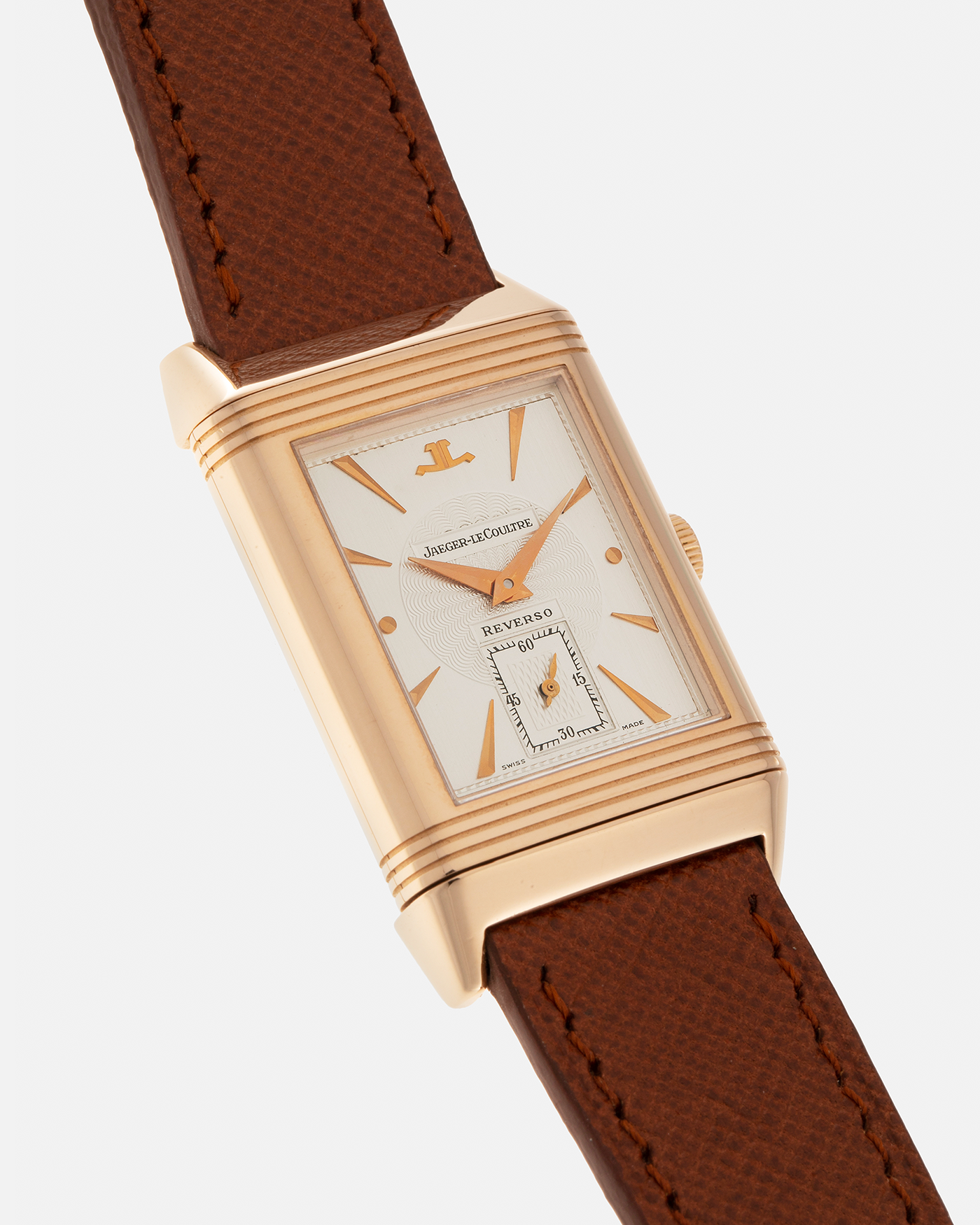 Brand: Jaeger LeCoultre
Year: 1990s
Model: Reverso Art Deco Skeleton Movement (Only 900 Pieces Made in Rose Gold)
Reference Number: 270.2.62 / Q2772420
Material: 18-carat Rose Gold
Movement: Jaeger LeCoultre Cal. 822AD, Manual-Winding
Case Diameter: 42mm (Including Lugs) x 26mm x 9.5mm
Lug Width: 19mm
Strap: Mr Watchley Saffiano Copper Brown Leather Strap with Signed 18-carat Rose Gold Deployant Clasp