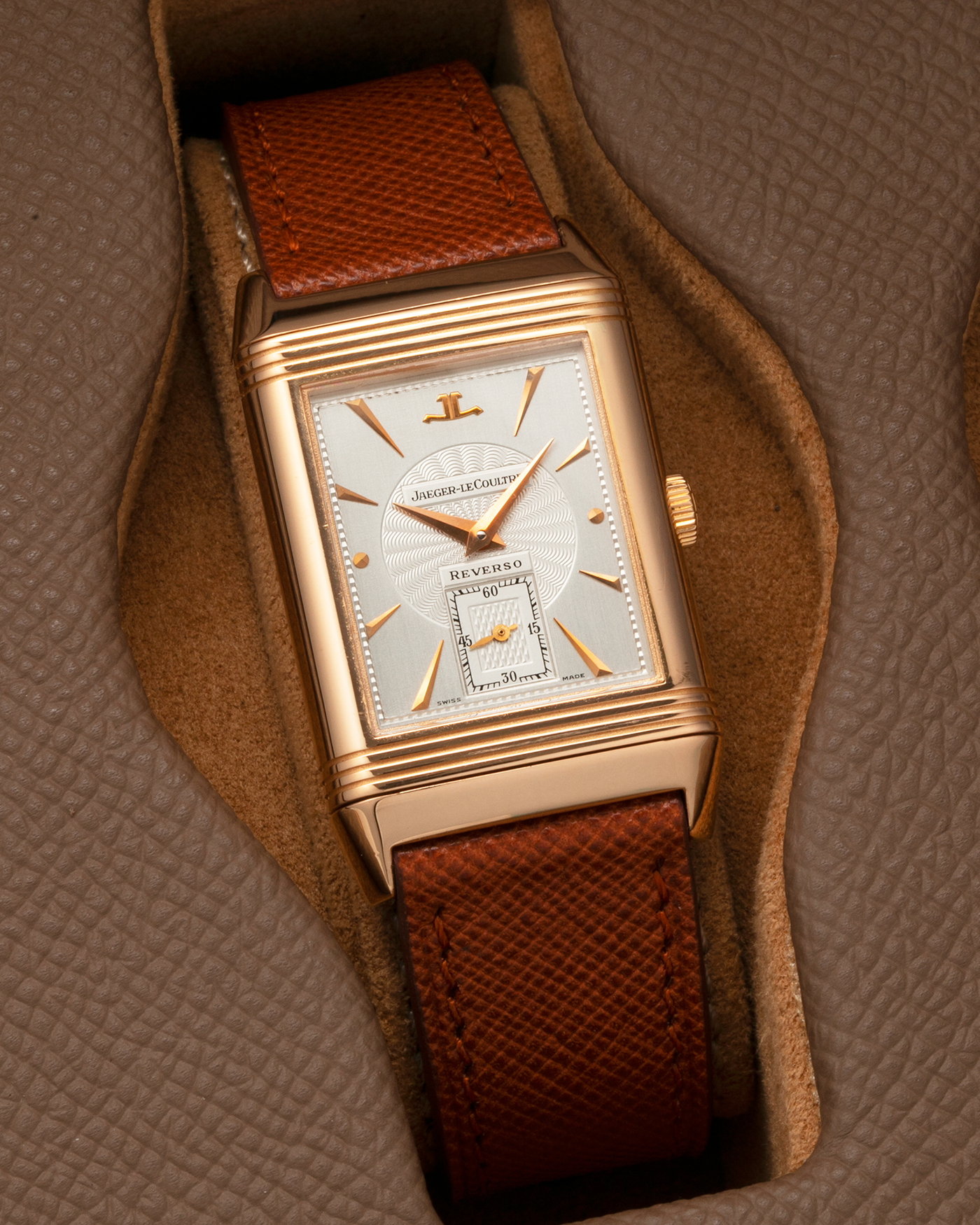 Brand: Jaeger LeCoultre
Year: 1990s
Model: Reverso Art Deco Skeleton Movement (Only 900 Pieces Made in Rose Gold)
Reference Number: 270.2.62 / Q2772420
Material: 18-carat Rose Gold
Movement: Jaeger LeCoultre Cal. 822AD, Manual-Winding
Case Diameter: 42mm (Including Lugs) x 26mm x 9.5mm
Lug Width: 19mm
Strap: Mr Watchley Saffiano Copper Brown Leather Strap with Signed 18-carat Rose Gold Deployant Clasp