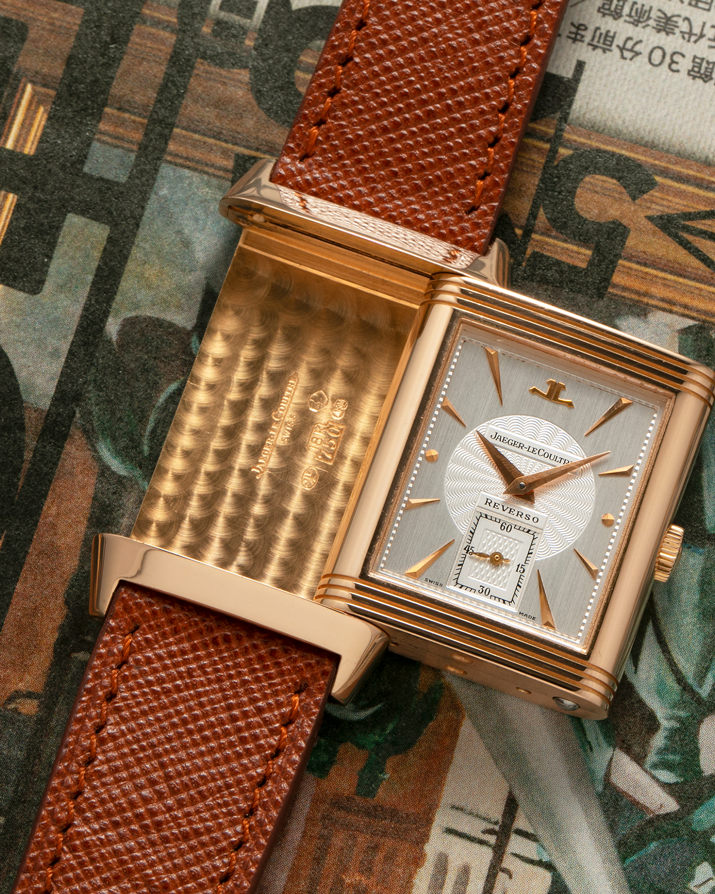 Brand: Jaeger LeCoultre
Year: 1990s
Model: Reverso Art Deco Skeleton Movement (Only 900 Pieces Made in Rose Gold)
Reference Number: 270.2.62 / Q2772420
Material: 18-carat Rose Gold
Movement: Jaeger LeCoultre Cal. 822AD, Manual-Winding
Case Diameter: 42mm (Including Lugs) x 26mm x 9.5mm
Lug Width: 19mm
Strap: Mr Watchley Saffiano Copper Brown Leather Strap with Signed 18-carat Rose Gold Deployant Clasp