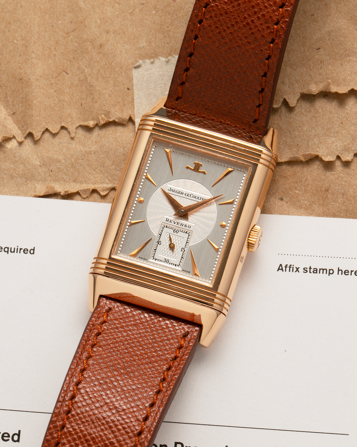 Brand: Jaeger LeCoultre
Year: 1990s
Model: Reverso Art Deco Skeleton Movement (Only 900 Pieces Made in Rose Gold)
Reference Number: 270.2.62 / Q2772420
Material: 18-carat Rose Gold
Movement: Jaeger LeCoultre Cal. 822AD, Manual-Winding
Case Diameter: 42mm (Including Lugs) x 26mm x 9.5mm
Lug Width: 19mm
Strap: Mr Watchley Saffiano Copper Brown Leather Strap with Signed 18-carat Rose Gold Deployant Clasp