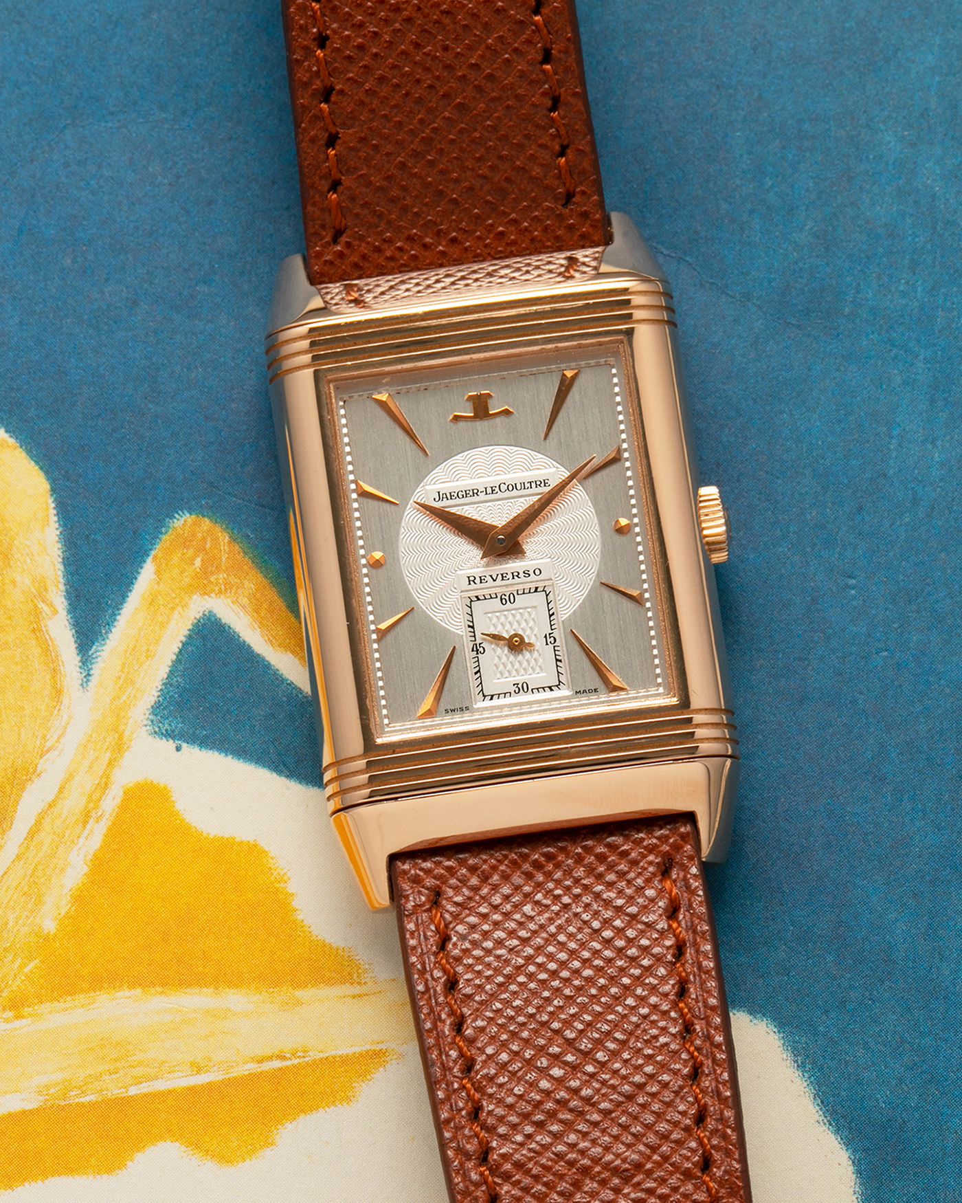 Brand: Jaeger LeCoultre
Year: 1990s
Model: Reverso Art Deco Skeleton Movement (Only 900 Pieces Made in Rose Gold)
Reference Number: 270.2.62 / Q2772420
Material: 18-carat Rose Gold
Movement: Jaeger LeCoultre Cal. 822AD, Manual-Winding
Case Diameter: 42mm (Including Lugs) x 26mm x 9.5mm
Lug Width: 19mm
Strap: Mr Watchley Saffiano Copper Brown Leather Strap with Signed 18-carat Rose Gold Deployant Clasp