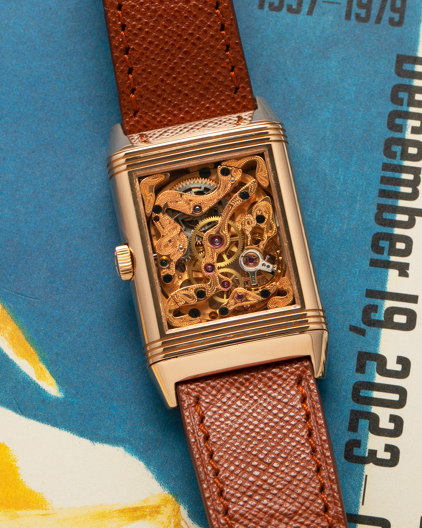 Brand: Jaeger LeCoultre
Year: 1990s
Model: Reverso Art Deco Skeleton Movement (Only 900 Pieces Made in Rose Gold)
Reference Number: 270.2.62 / Q2772420
Material: 18-carat Rose Gold
Movement: Jaeger LeCoultre Cal. 822AD, Manual-Winding
Case Diameter: 42mm (Including Lugs) x 26mm x 9.5mm
Lug Width: 19mm
Strap: Mr Watchley Saffiano Copper Brown Leather Strap with Signed 18-carat Rose Gold Deployant Clasp