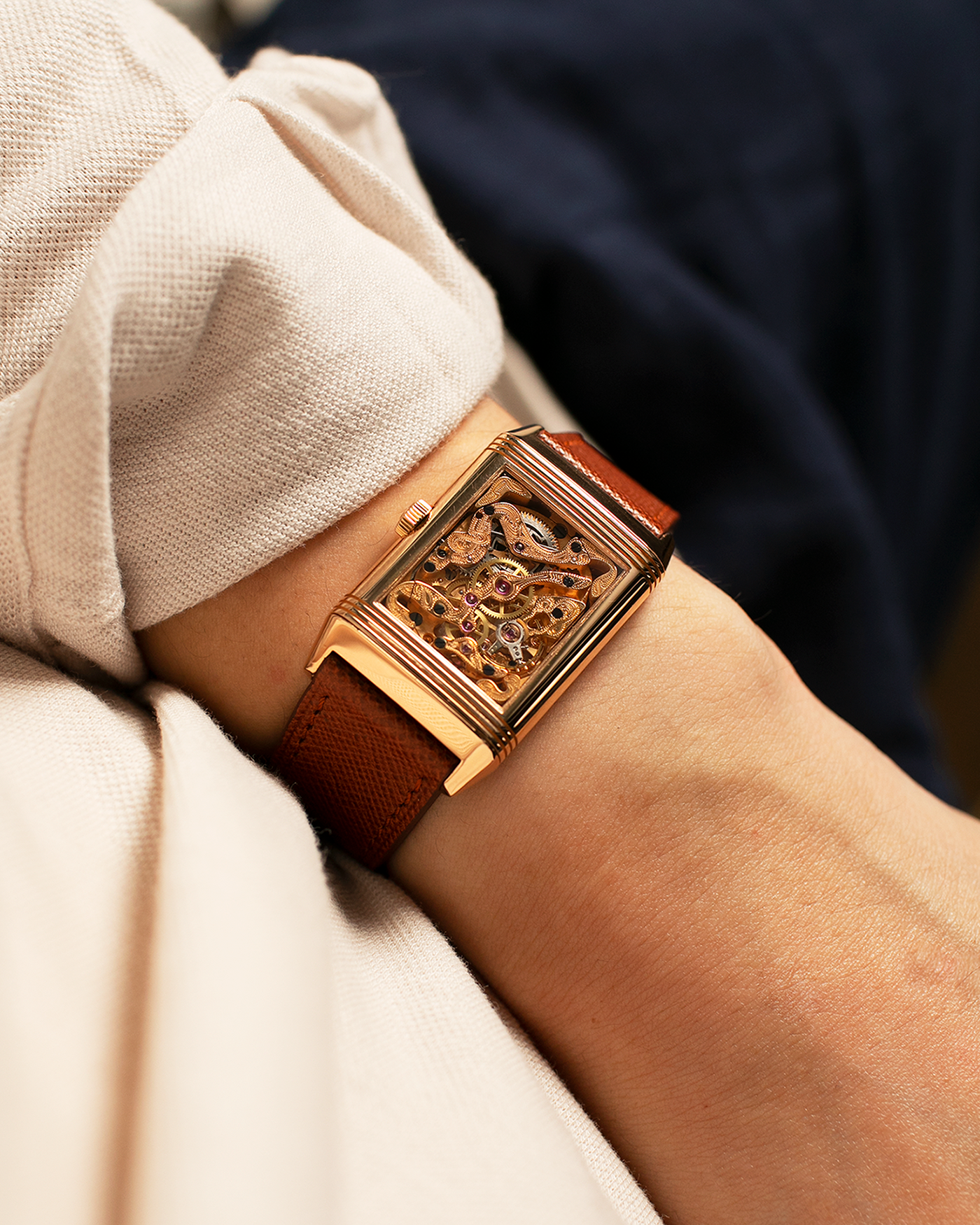 Brand: Jaeger LeCoultre
Year: 1990s
Model: Reverso Art Deco Skeleton Movement (Only 900 Pieces Made in Rose Gold)
Reference Number: 270.2.62 / Q2772420
Material: 18-carat Rose Gold
Movement: Jaeger LeCoultre Cal. 822AD, Manual-Winding
Case Diameter: 42mm (Including Lugs) x 26mm x 9.5mm
Lug Width: 19mm
Strap: Mr Watchley Saffiano Copper Brown Leather Strap with Signed 18-carat Rose Gold Deployant Clasp