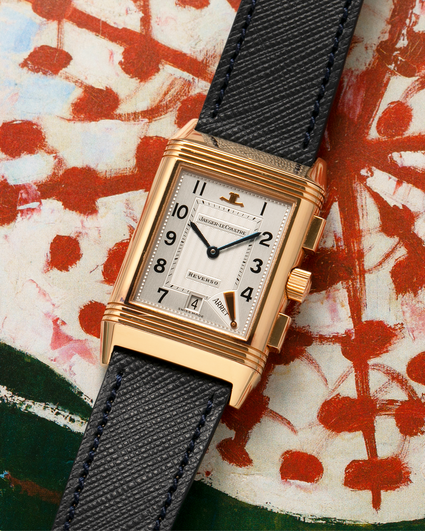 Brand: Jaeger LeCoultre Year: 1996 Model: Reverso Chronographe Retrograde, Limited to 500 pieces Reference: 270.2.69 Material: 18-carat Rose Gold Movement: Jaeger LeCoultre Cal. 829, Manual-Wind Case Dimensions: 42mm x 26mm x 9.5mm Lug Width: 19mm Strap: Molequin Navy Blue Textured Calf with Signed 18-carat Rose Gold Deployant Clasp