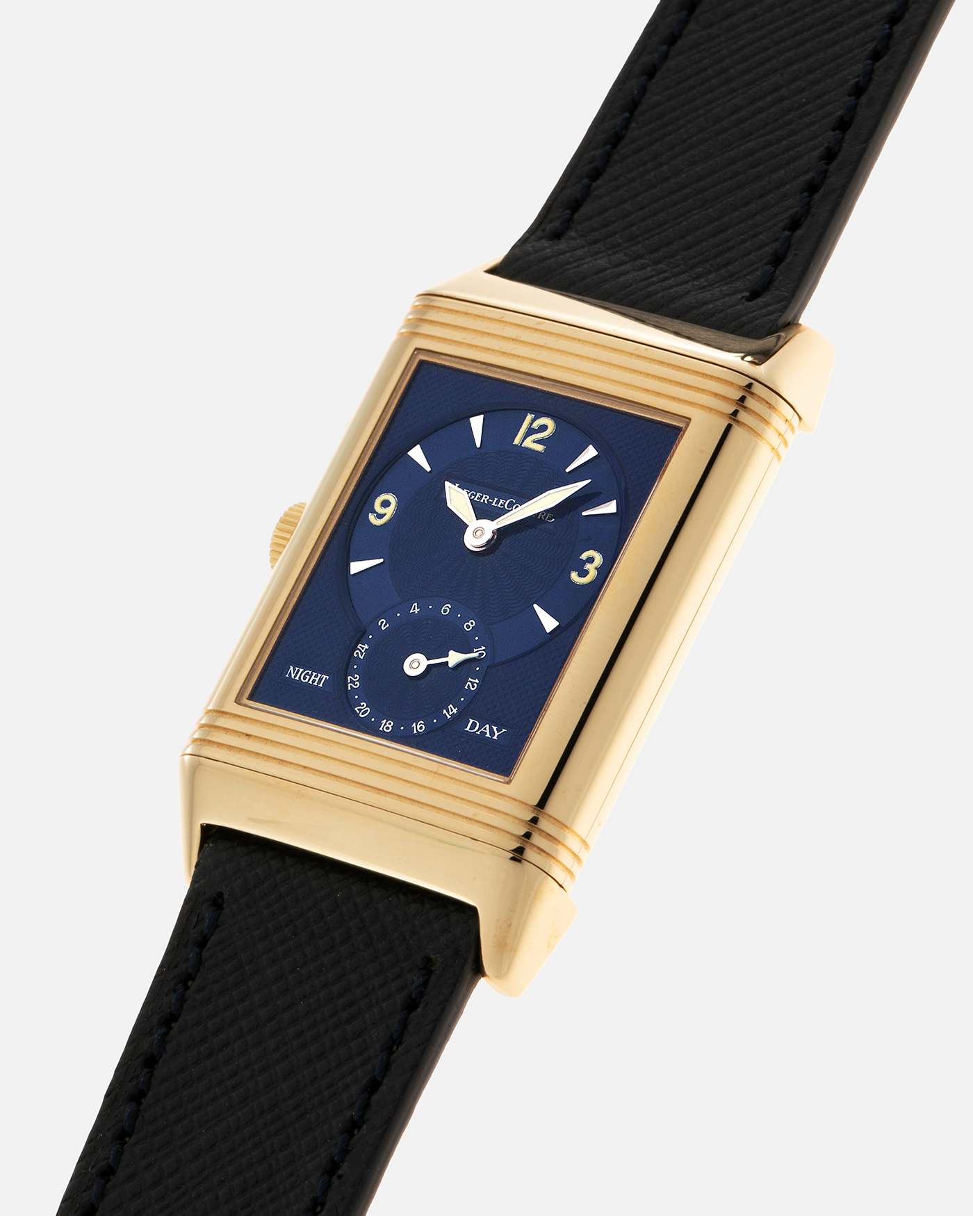 Brand: Jaeger LeCoultre Year: 2000s Model: Reverso Duoface Japan Edition Blue, Limited Edition of 39 Pieces Reference Number: 270.1.54 Case Material: 18-carat Yellow Gold Movement: Jaeger LeCoultre Cal. 854, Manual-Wind Case Diameter: 42mm x 26mm Lug Width: 19mm Strap: Molequin Navy Blue Textured Calf Leather Strap with Signed 1-carat Yellow Gold Deployant Clasp, with additional Jaeger LeCoultre Black Alligator Leather Strap (Used)