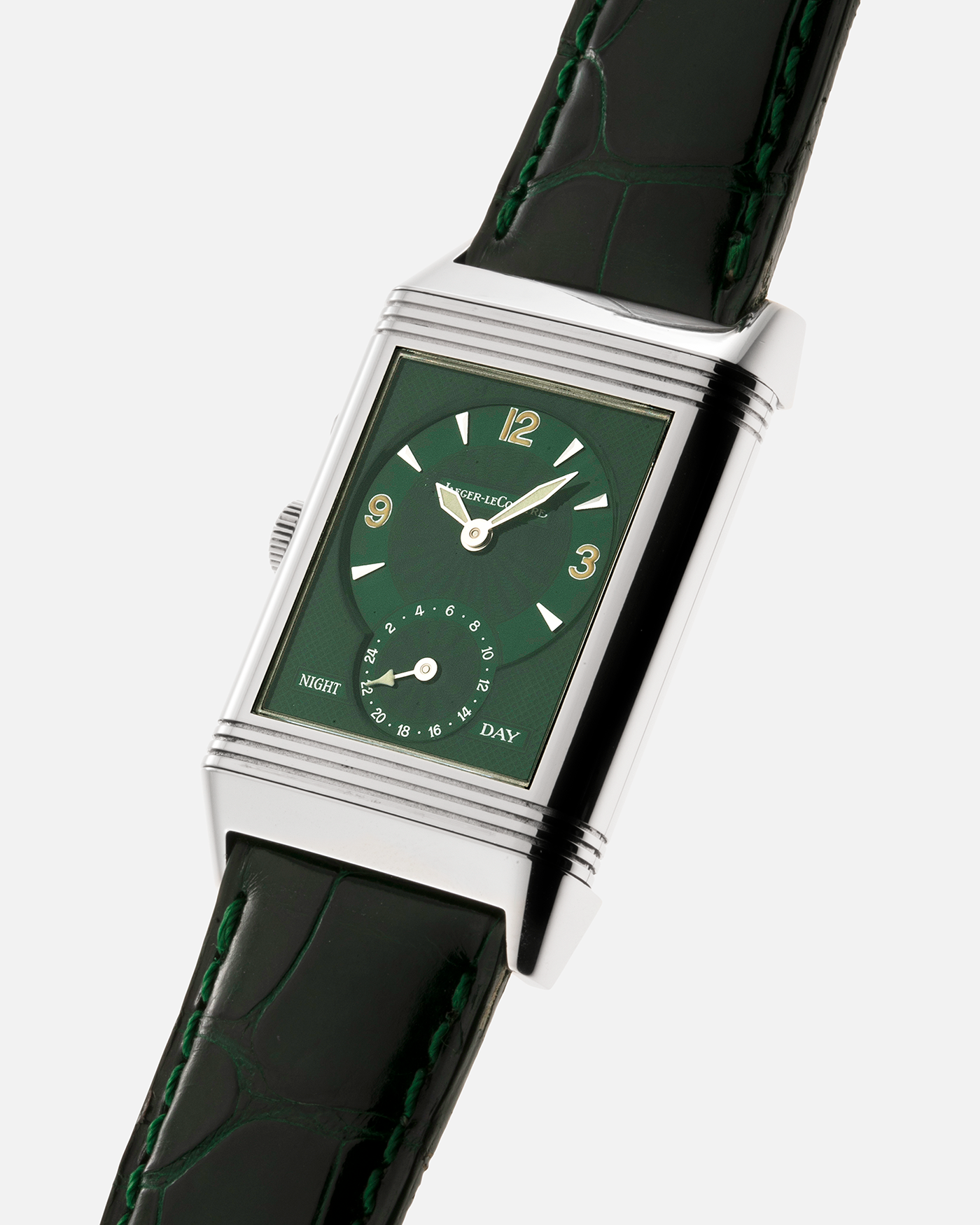 Brand: Jaeger-LeCoultre Year: 1999 Model: Reverso Duo Serie Premier, Ref. 270.8.54 Green Japan Edition Material: Stainless Steel Movement: Cal. 854, Manual-Wind Case Diameter: 42 x 26mm Bracelet/Strap: Emerald Green Crocodile Leather Strap with Signed Stainless Steel Deployant Clasp