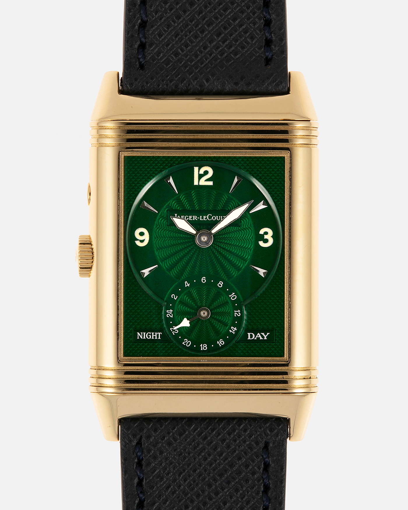 Brand: Jaeger LeCoultre
Year: 1990s
Model: Reverso Duoface Japan Edition Green, Limited Edition of 39 Pieces
Reference Number: 270.1.54
Material: 18-carat Yellow Gold
Movement: Jaeger LeCoultre Cal. 854, Manual-Wind
Case Diameter: 42mm (including lugs) x 26mm x 9.5mm
Lug Width: 19mm
Strap/Bracelet: Molequin Navy Blue Textured Calf Leather Strap with 18 carat JLC deployant clasp, with additional Two-Toned Jaeger LeCoultre signed bracelet
