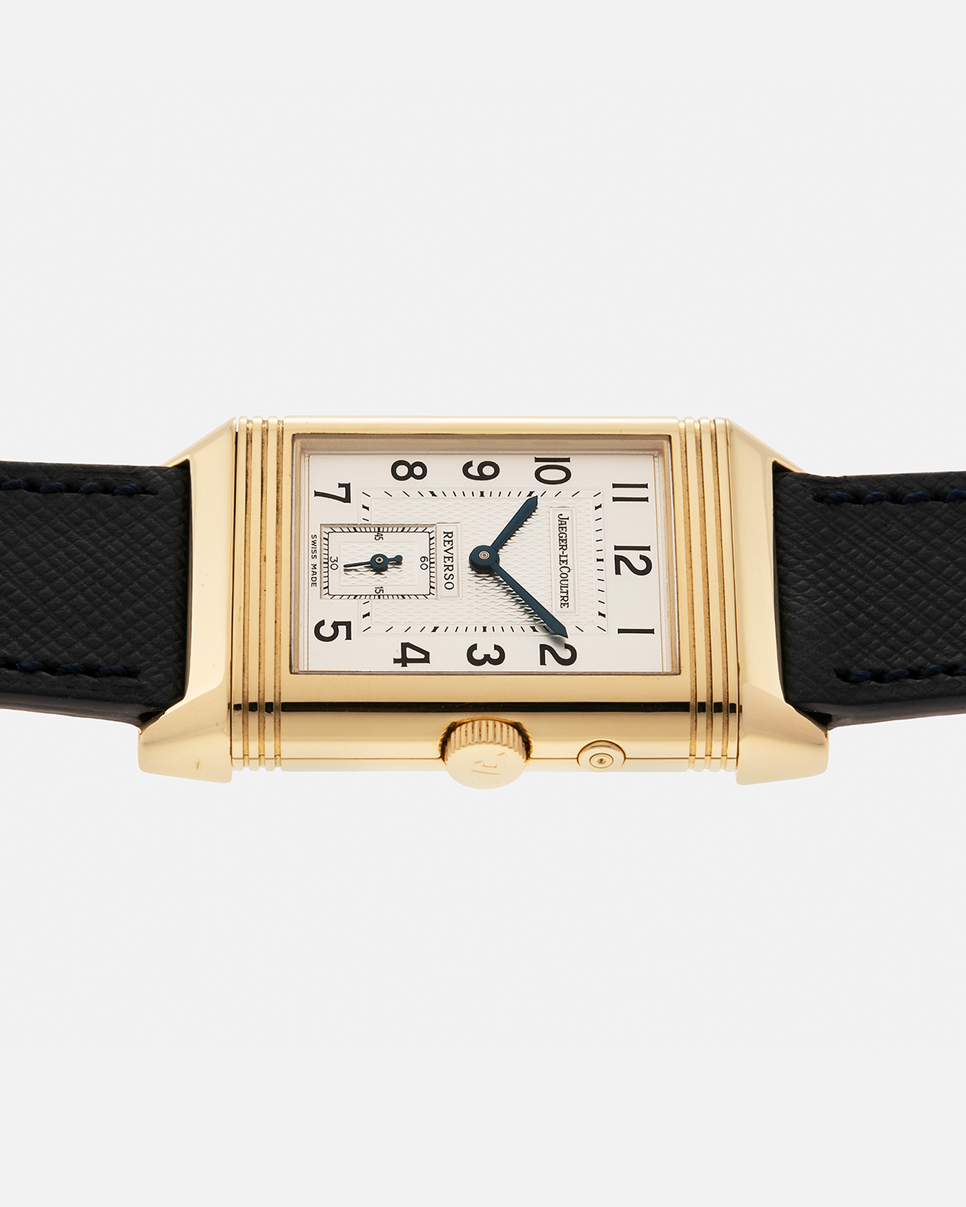 Brand: Jaeger LeCoultre
Year: 1990s
Model: Reverso Duoface Japan Edition Green, Limited Edition of 39 Pieces
Reference Number: 270.1.54
Material: 18-carat Yellow Gold
Movement: Jaeger LeCoultre Cal. 854, Manual-Wind
Case Diameter: 42mm (including lugs) x 26mm x 9.5mm
Lug Width: 19mm
Strap/Bracelet: Molequin Navy Blue Textured Calf Leather Strap with 18 carat JLC deployant clasp, with additional Two-Toned Jaeger LeCoultre signed bracelet