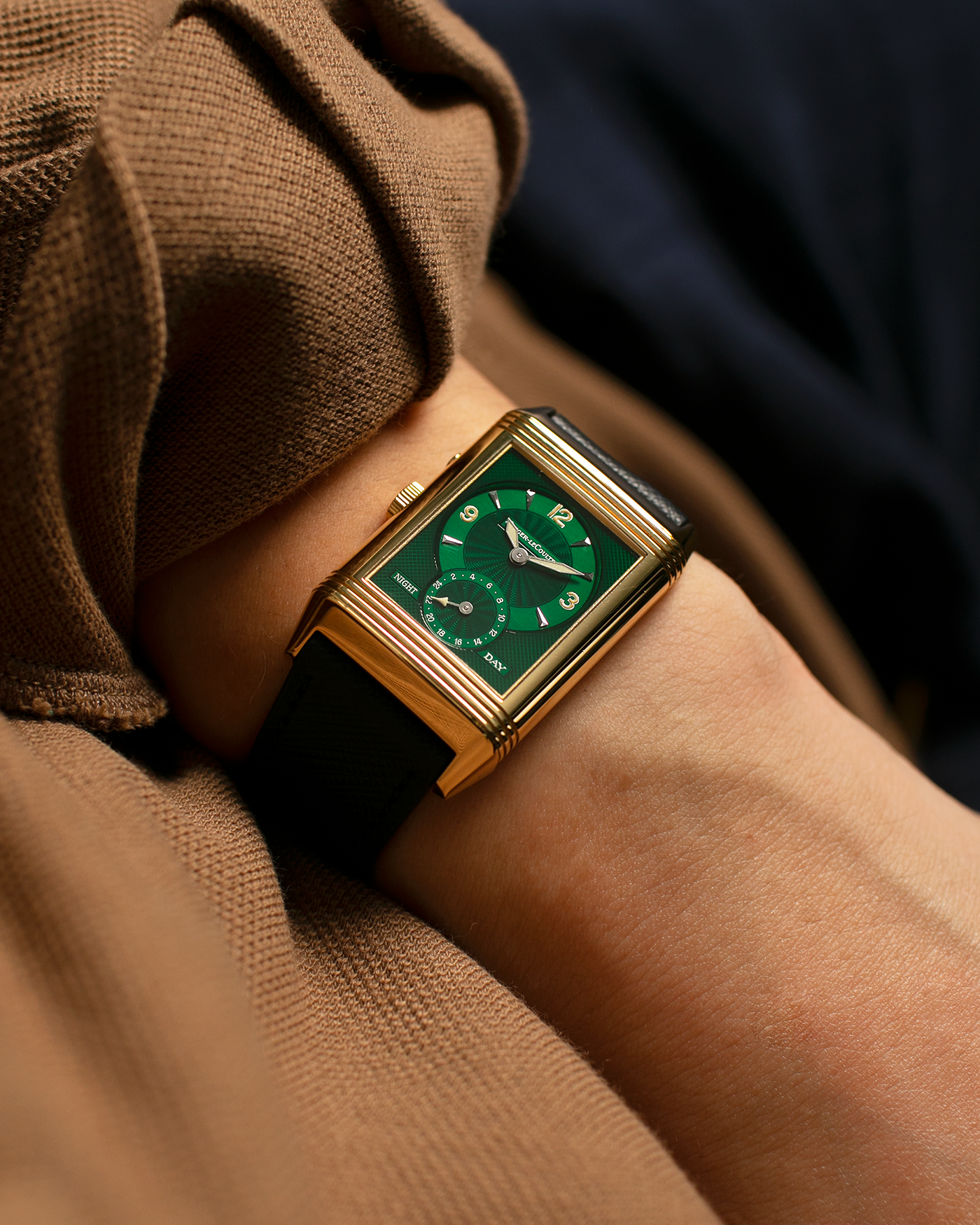 Brand: Jaeger LeCoultre
Year: 1990s
Model: Reverso Duoface Japan Edition Green, Limited Edition of 39 Pieces
Reference Number: 270.1.54
Material: 18-carat Yellow Gold
Movement: Jaeger LeCoultre Cal. 854, Manual-Wind
Case Diameter: 42mm (including lugs) x 26mm x 9.5mm
Lug Width: 19mm
Strap/Bracelet: Molequin Navy Blue Textured Calf Leather Strap with 18 carat JLC deployant clasp, with additional Two-Toned Jaeger LeCoultre signed bracelet