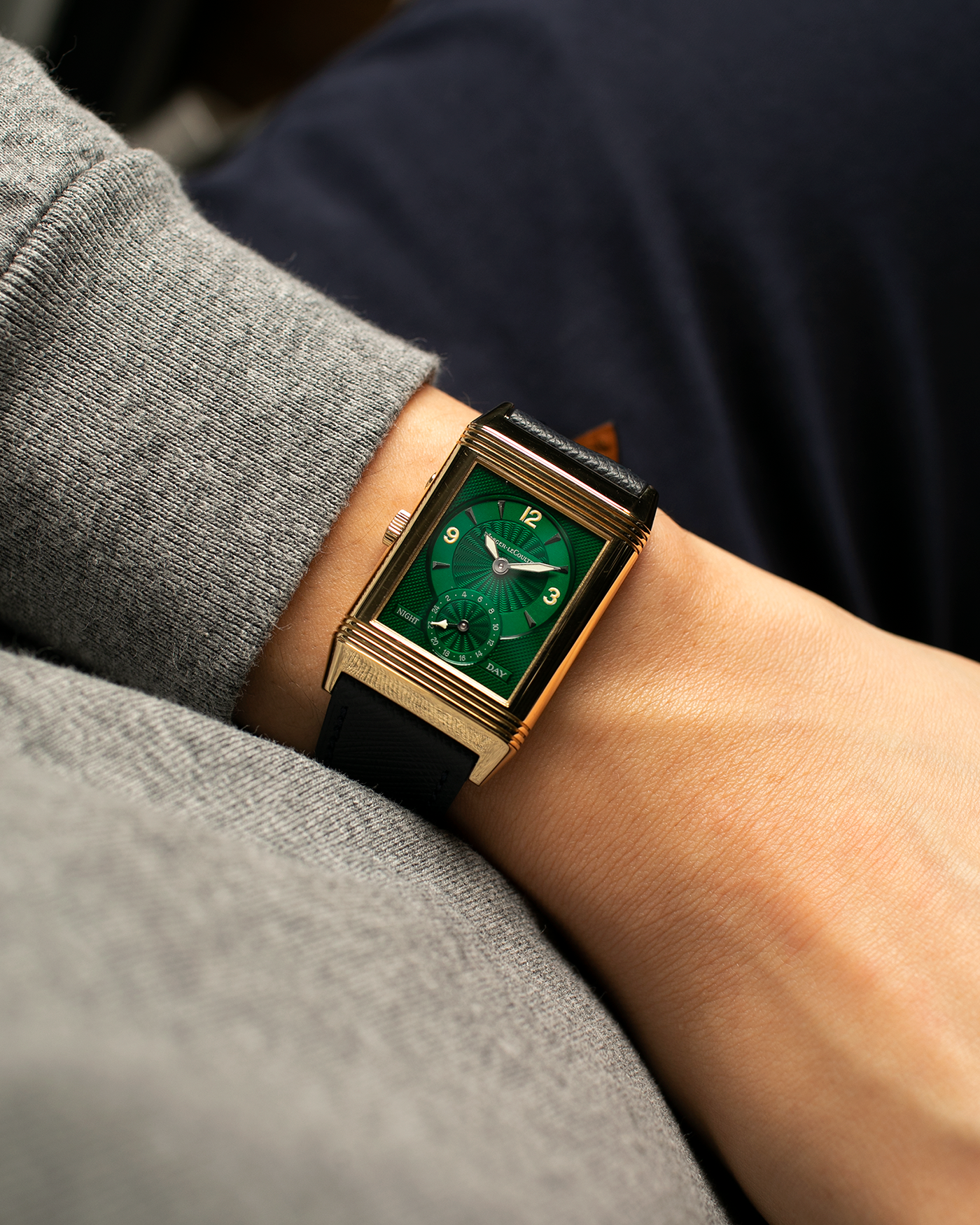 Brand: Jaeger LeCoultre
Year: 1990s
Model: Reverso Duoface Japan Edition Green, Limited Edition of 39 Pieces
Reference Number: 270.1.54
Material: 18-carat Yellow Gold
Movement: Jaeger LeCoultre Cal. 854, Manual-Wind
Case Diameter: 42mm (including lugs) x 26mm x 9.5mm
Lug Width: 19mm
Strap/Bracelet: Molequin Navy Blue Textured Calf Leather Strap with 18 carat JLC deployant clasp, with additional Two-Toned Jaeger LeCoultre signed bracelet