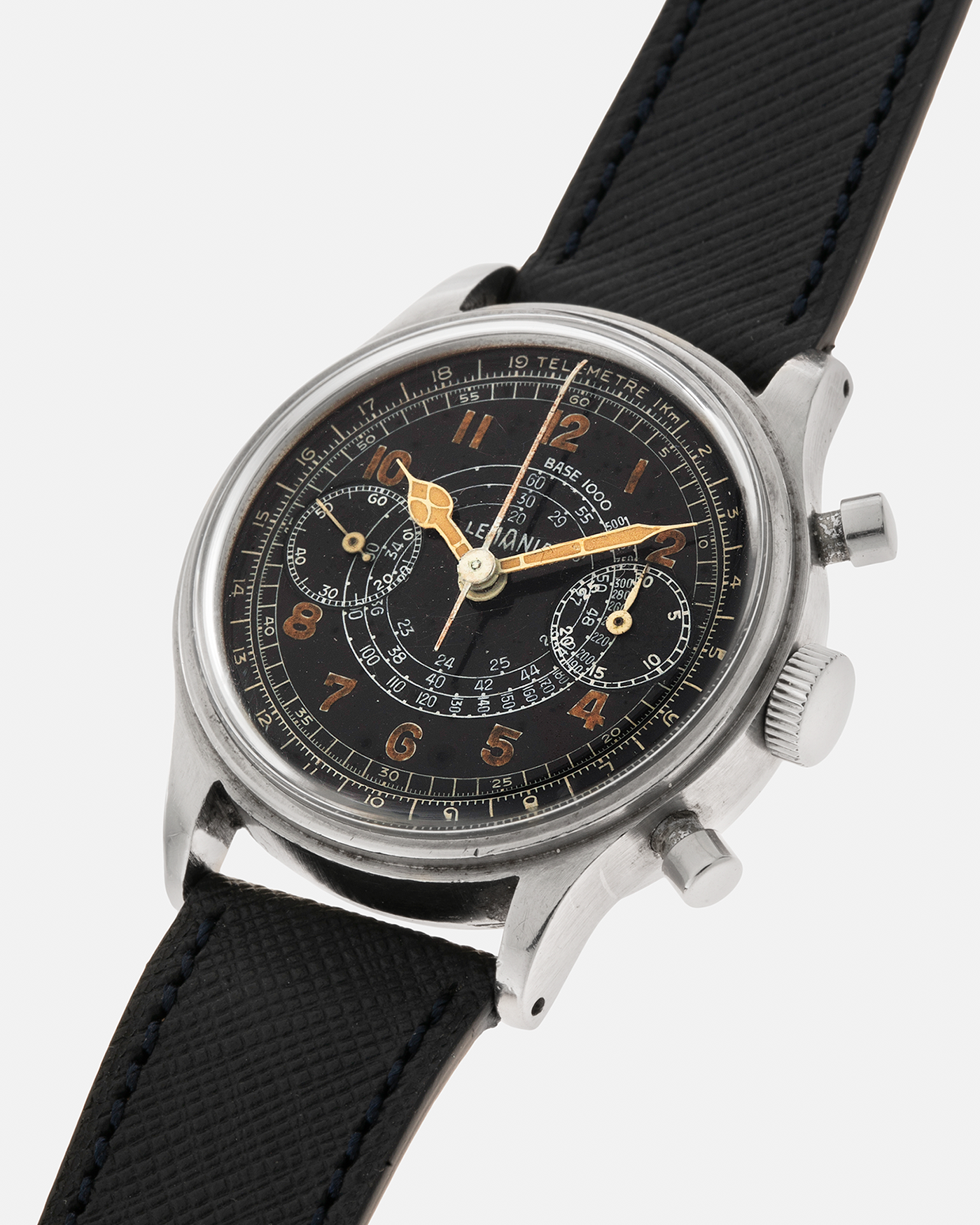 Brand: Lemania
Year: 1940’s
Model: 15TL
Material: Stainless Steel
Movement: Lemania Cal. 15TL, Manual-Winding
Case Dimensions: 38mm x 14mm (Lug-to-Lug 45.25mm)
Lug Width: 20mm
Strap: Nostime Dark Navy Textured Calf Leather Strap