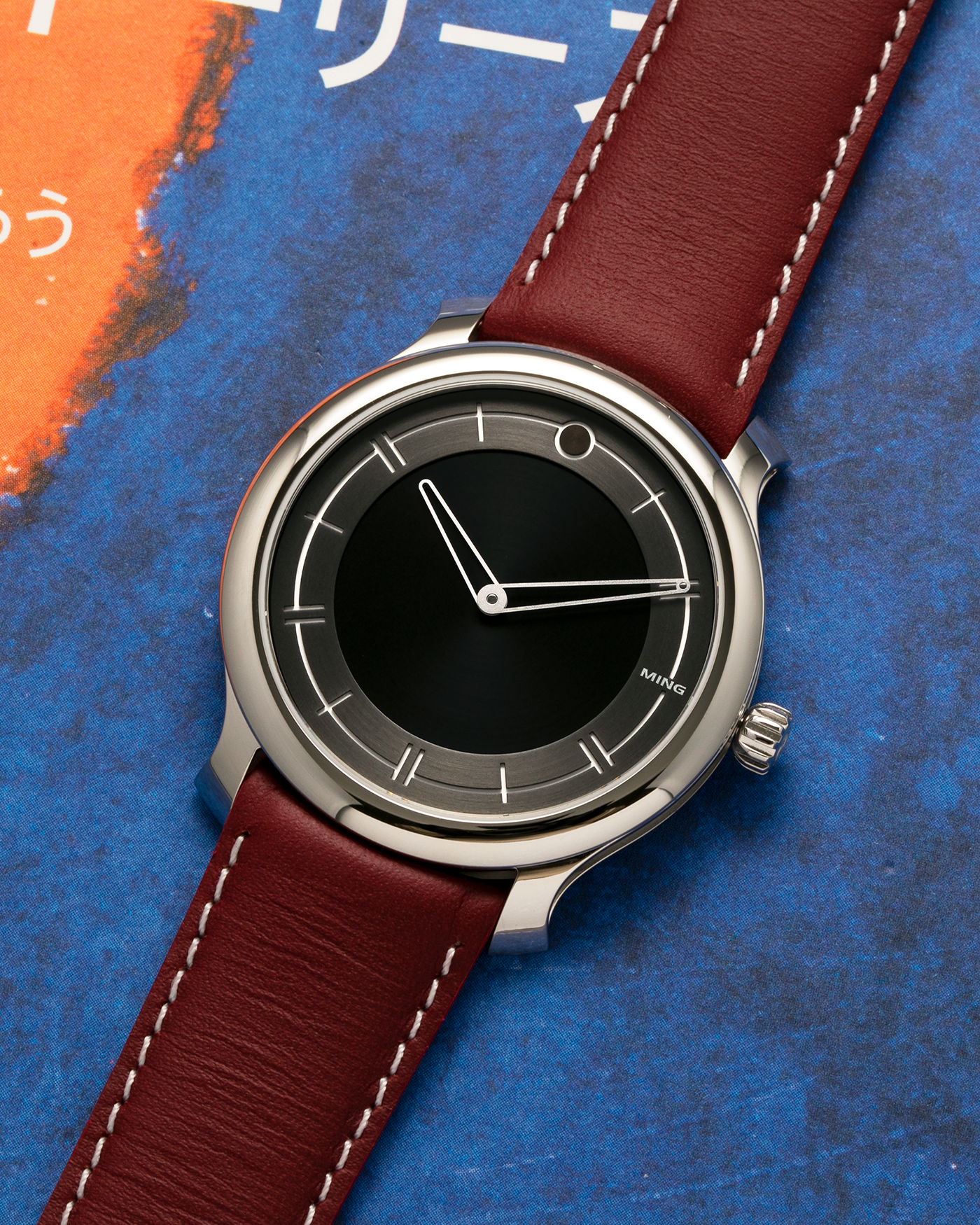 Brand: MING
Year: 2021
Model: 27.01
Material: Stainless Steel
Movement: ETA Peseux Cal. 7001 (Heavily Modified), Manual-Winding
Case Dimensions: 38mm x 6.9mm
Lug Width: 20mm
Strap: Jean Rousseau Maroon Grey Leather Strap for MING with signed Stainless Steel Tang Buckle