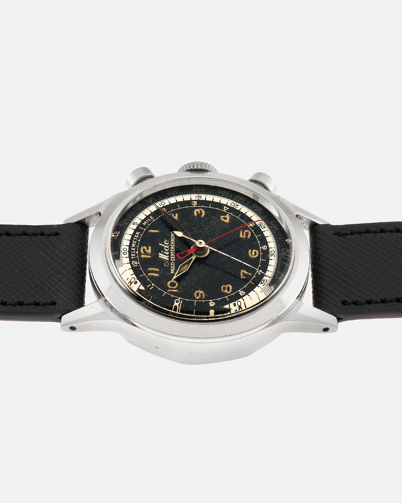 Brand: Mido
Year: Late 1940’s
Model: Multi-Centerchrono
Material: Stainless Steel
Movement: Mido Cal. 1300 (Modified Valjoux ZN), Manual-Winding
Case Diameter: 35mm
Lug Width: 18mm
Strap: Molequin Black Textured Calf Leather Strap