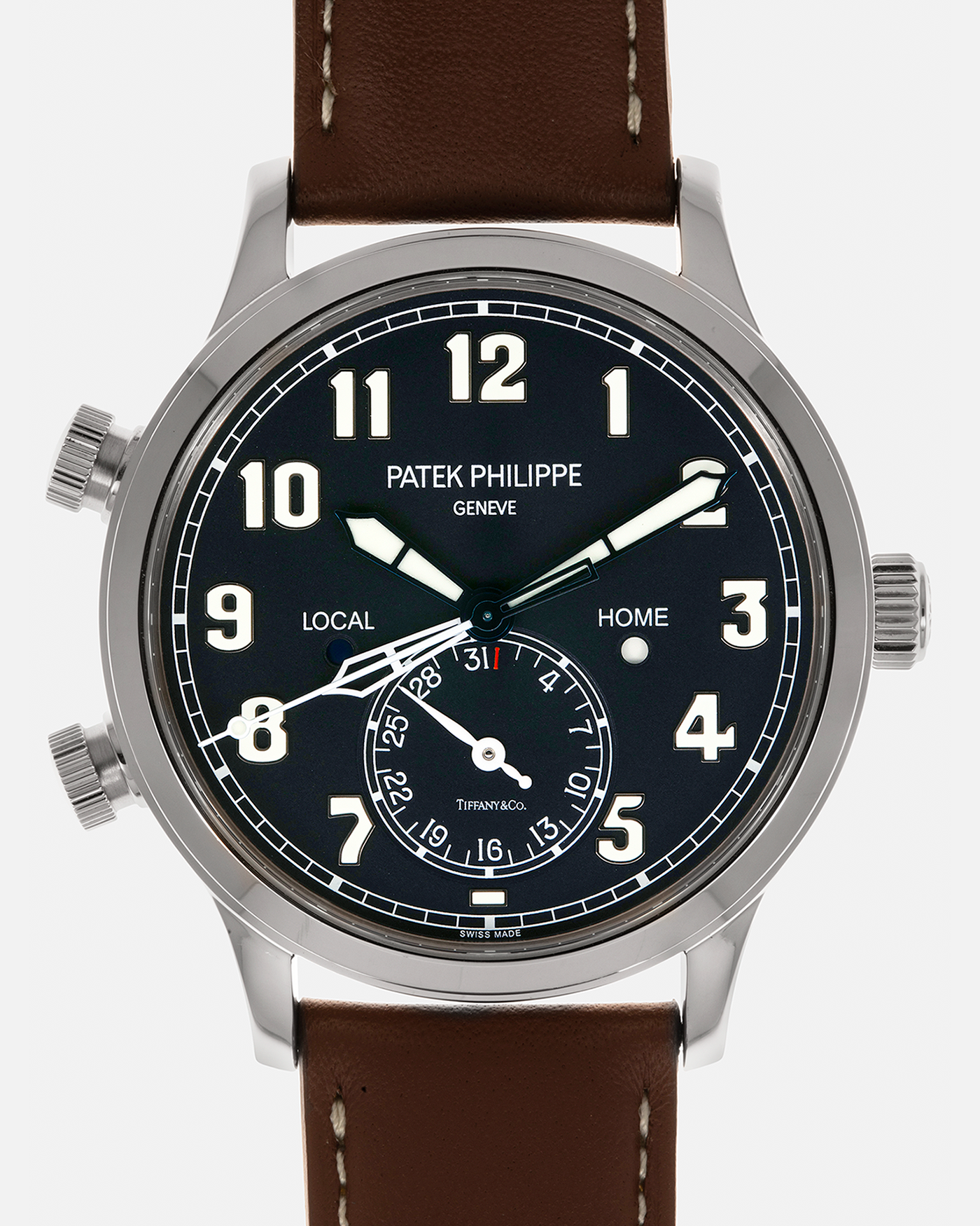 Brand: Patek Philippe
Year: 2020
Model: Calatrava Pilot Travel Time ‘Tiffany & Co.’
Reference: 5524G
Material: 18-carat White Gold
Movement: Patek Philippe Cal. 324 S C FUS, Self-Winding
Case Diameter: 42mm x 10.8mm (Lug-to-Lug 50mm)
Lug Width: 22mm
Strap: Patek Philippe Brown Leather Strap with Signed 18-carat White Gold Tang Buckle