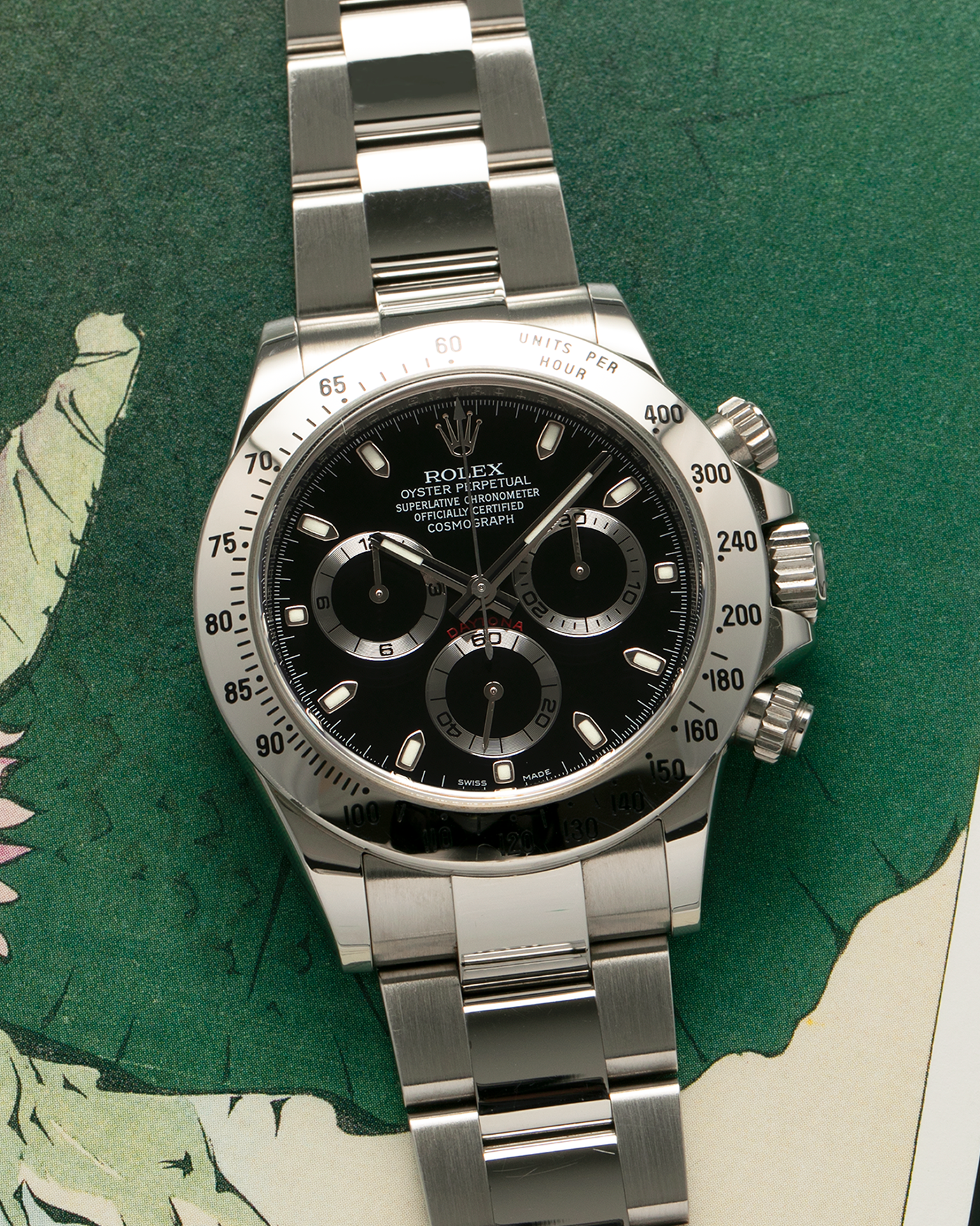 Brand: Rolex
Year: 2010s
Model: Cosmograph Daytona
Reference: 116520
Material: Stainless Steel
Movement: Rolex Cal. 4130, Self-Winding
Case Dimensions: 40mm x 12mm (Lug-to-Lug 47mm)
Lug Width: 20mm
Bracelet: Rolex Stainless Steel Oyster Bracelet with Signed Deployant Clasp