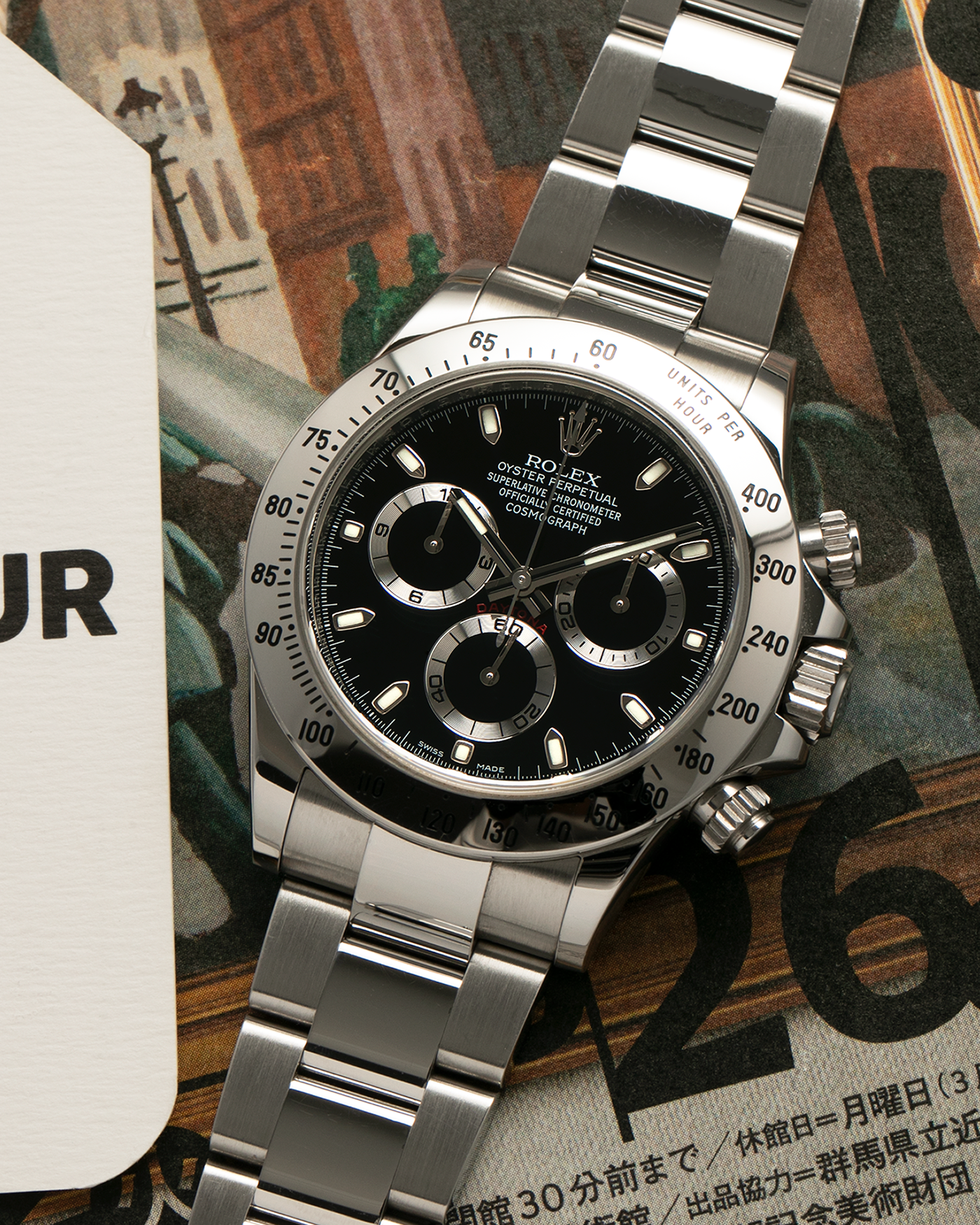 Brand: Rolex
Year: 2010s
Model: Cosmograph Daytona
Reference: 116520
Material: Stainless Steel
Movement: Rolex Cal. 4130, Self-Winding
Case Dimensions: 40mm x 12mm (Lug-to-Lug 47mm)
Lug Width: 20mm
Bracelet: Rolex Stainless Steel Oyster Bracelet with Signed Deployant Clasp
