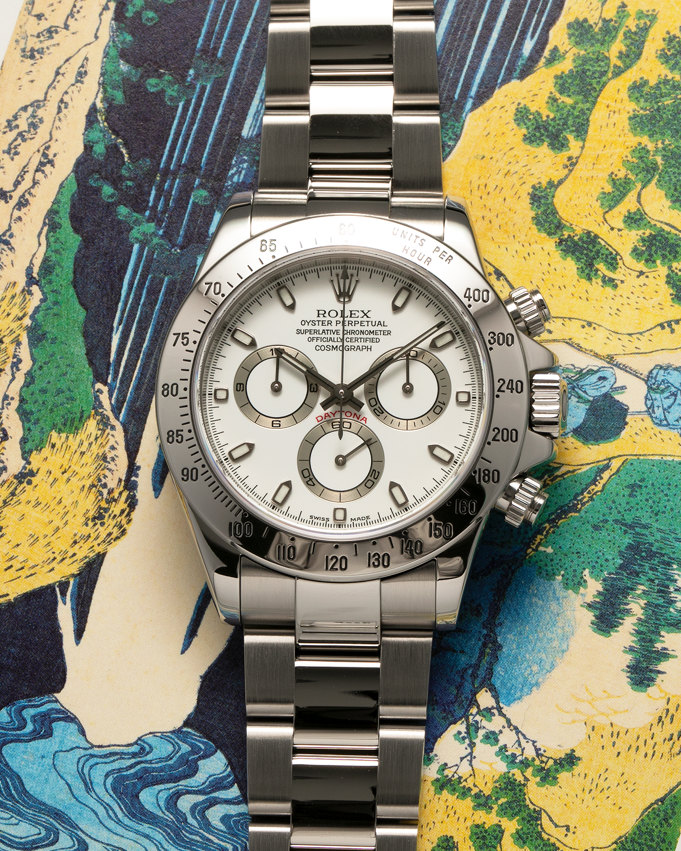 Brand: Rolex Year: 2000 Model: Cosmograph Daytona Reference: 116520 Serial Number: P414XXX Material: Stainless Steel Movement: Rolex Cal. 4130, Self-Winding Case Diameter: 40mm Lug Width: 20mm Bracelet: Rolex Oyster ‘DE2 78490’ Bracelet in Stainless Steel