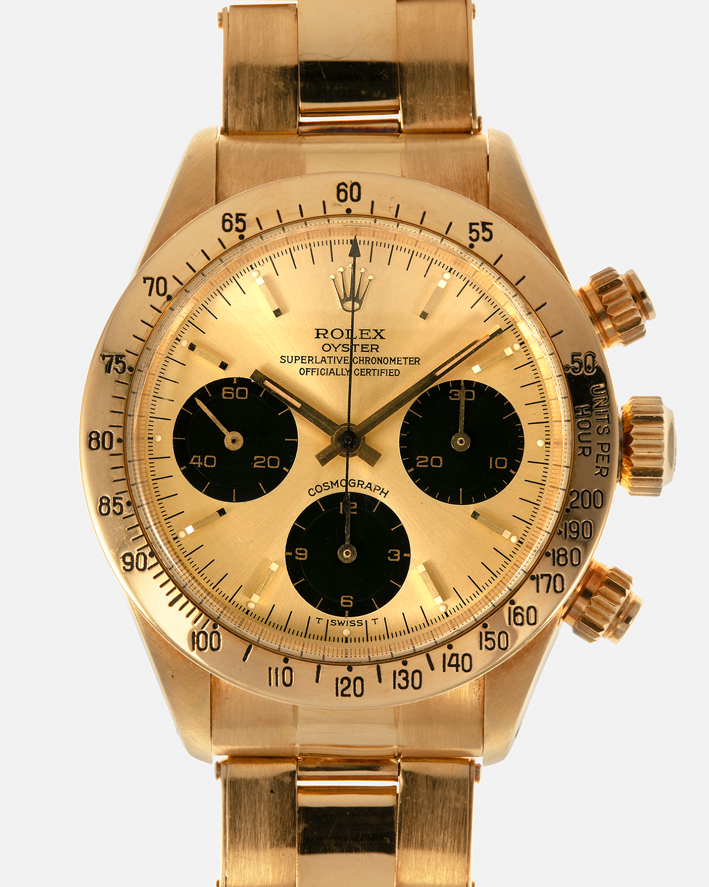 Brand: Rolex
Year: 1979
Model: Cosmograph Daytona
Serial Number: 595XXXX
Reference Number: 6265
Material: 18-carat Yellow Gold
Movement: Rolex Cal. 727 (Based on Valjoux Cal. 72), Manual-Winding
Case Diameter: 37.5mm x 13.5mm (Lug-to-Lug 45mm)
Lug Width: 19mm
Bracelet: Rolex Oyster Swiss Rivet Bracelet in 18-carat Yellow Gold with ‘57’ Curved End Links and Signed Clasp