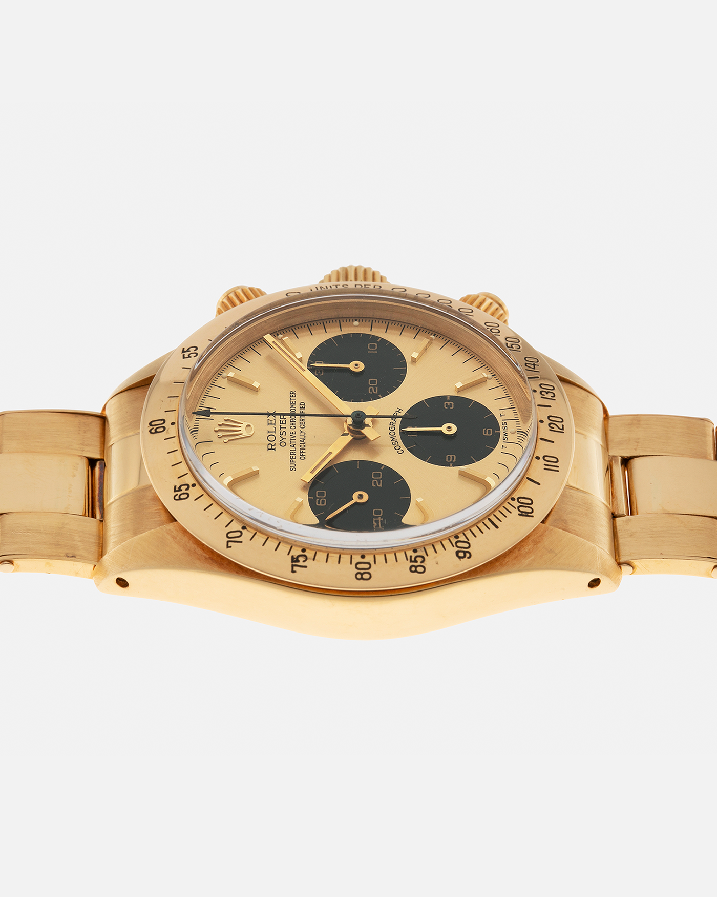 Brand: Rolex
Year: 1979
Model: Cosmograph Daytona
Serial Number: 595XXXX
Reference Number: 6265
Material: 18-carat Yellow Gold
Movement: Rolex Cal. 727 (Based on Valjoux Cal. 72), Manual-Winding
Case Diameter: 37.5mm x 13.5mm (Lug-to-Lug 45mm)
Lug Width: 19mm
Bracelet: Rolex Oyster Swiss Rivet Bracelet in 18-carat Yellow Gold with ‘57’ Curved End Links and Signed Clasp