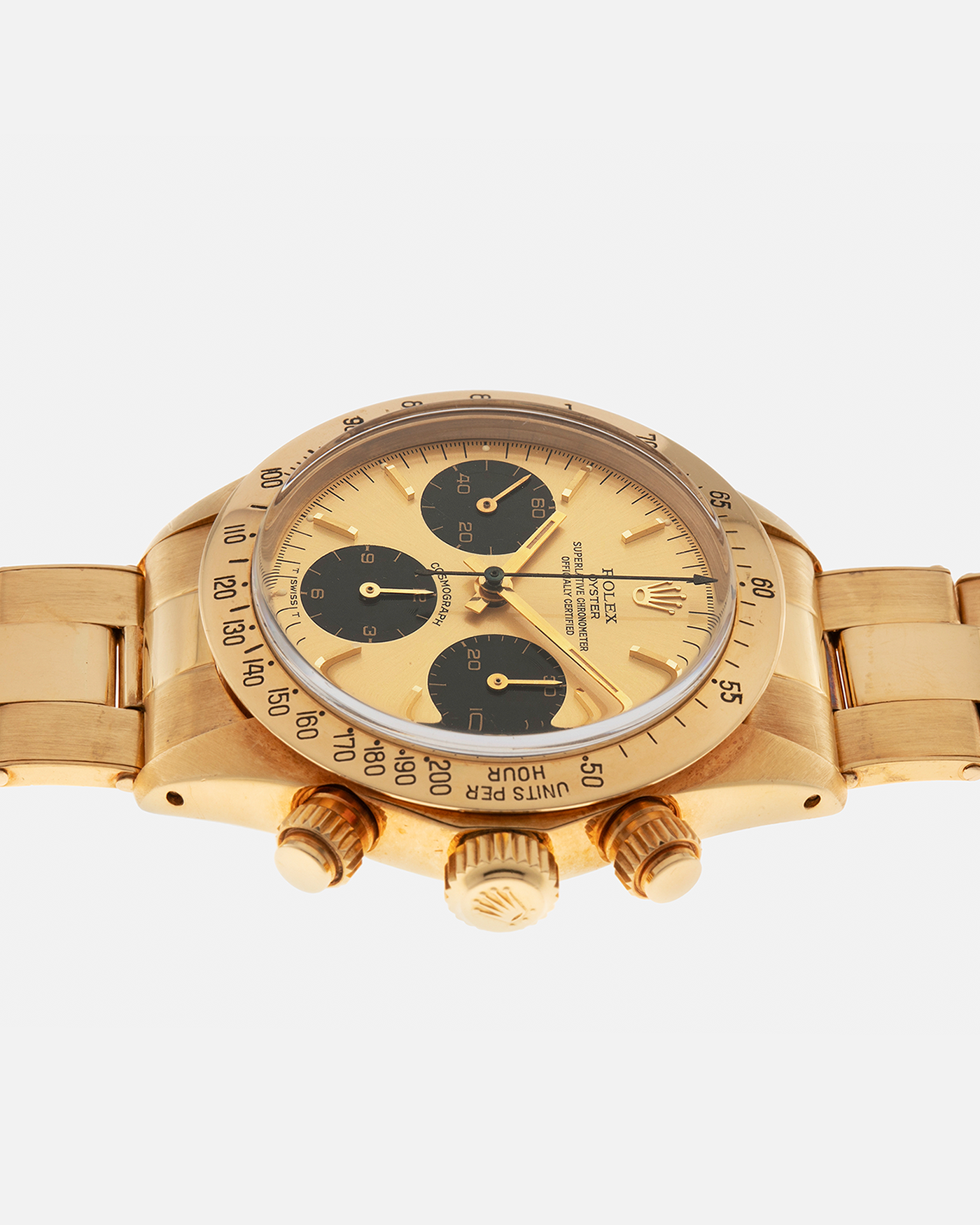 Brand: Rolex
Year: 1979
Model: Cosmograph Daytona
Serial Number: 595XXXX
Reference Number: 6265
Material: 18-carat Yellow Gold
Movement: Rolex Cal. 727 (Based on Valjoux Cal. 72), Manual-Winding
Case Diameter: 37.5mm x 13.5mm (Lug-to-Lug 45mm)
Lug Width: 19mm
Bracelet: Rolex Oyster Swiss Rivet Bracelet in 18-carat Yellow Gold with ‘57’ Curved End Links and Signed Clasp