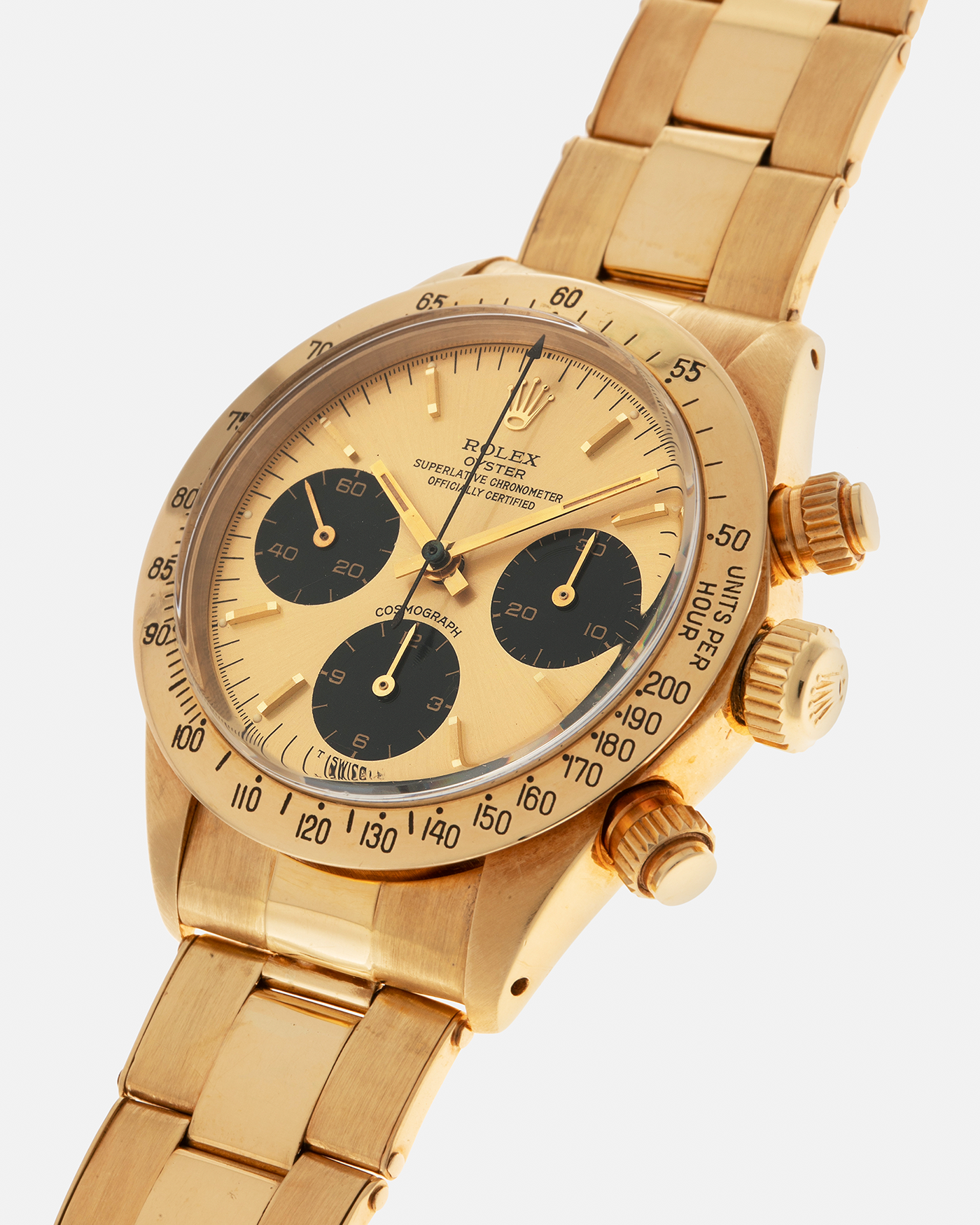 Brand: Rolex
Year: 1979
Model: Cosmograph Daytona
Serial Number: 595XXXX
Reference Number: 6265
Material: 18-carat Yellow Gold
Movement: Rolex Cal. 727 (Based on Valjoux Cal. 72), Manual-Winding
Case Diameter: 37.5mm x 13.5mm (Lug-to-Lug 45mm)
Lug Width: 19mm
Bracelet: Rolex Oyster Swiss Rivet Bracelet in 18-carat Yellow Gold with ‘57’ Curved End Links and Signed Clasp