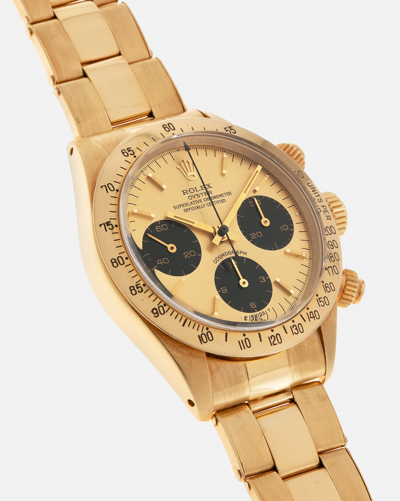 Brand: Rolex
Year: 1979
Model: Cosmograph Daytona
Serial Number: 595XXXX
Reference Number: 6265
Material: 18-carat Yellow Gold
Movement: Rolex Cal. 727 (Based on Valjoux Cal. 72), Manual-Winding
Case Diameter: 37.5mm x 13.5mm (Lug-to-Lug 45mm)
Lug Width: 19mm
Bracelet: Rolex Oyster Swiss Rivet Bracelet in 18-carat Yellow Gold with ‘57’ Curved End Links and Signed Clasp